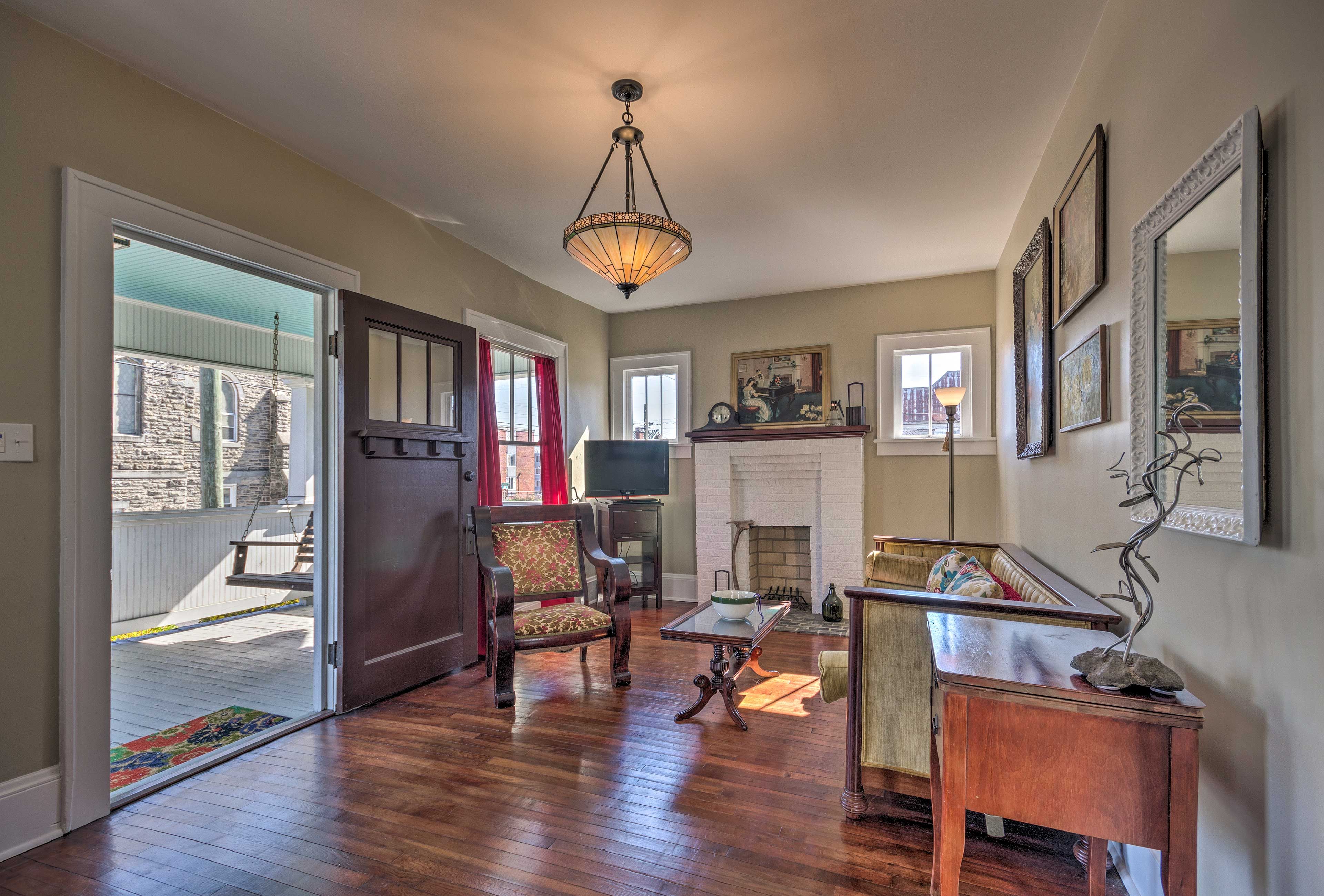 The restored home has beautiful antique furnishings.