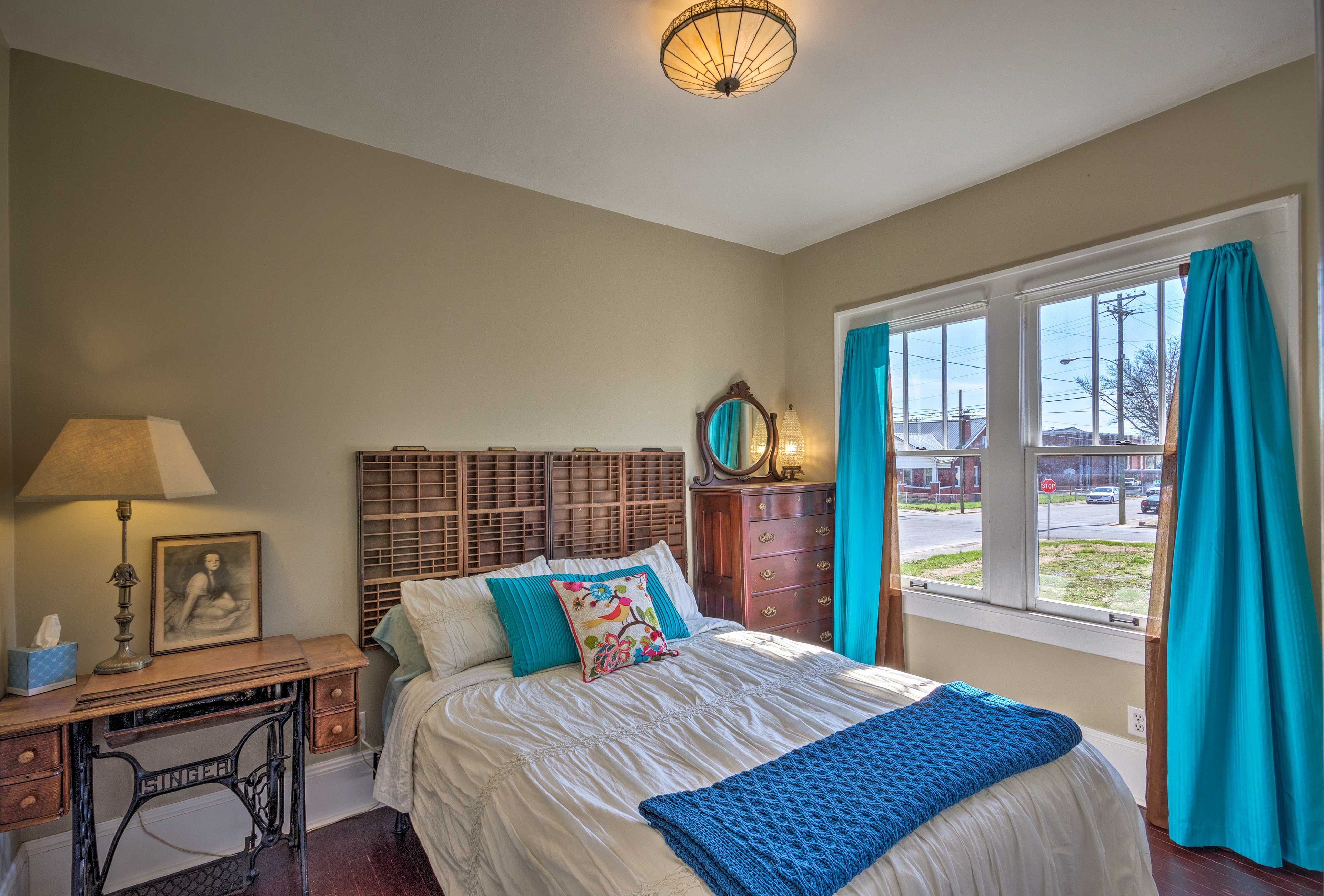 This first-floor bedroom has a full-sized bed.