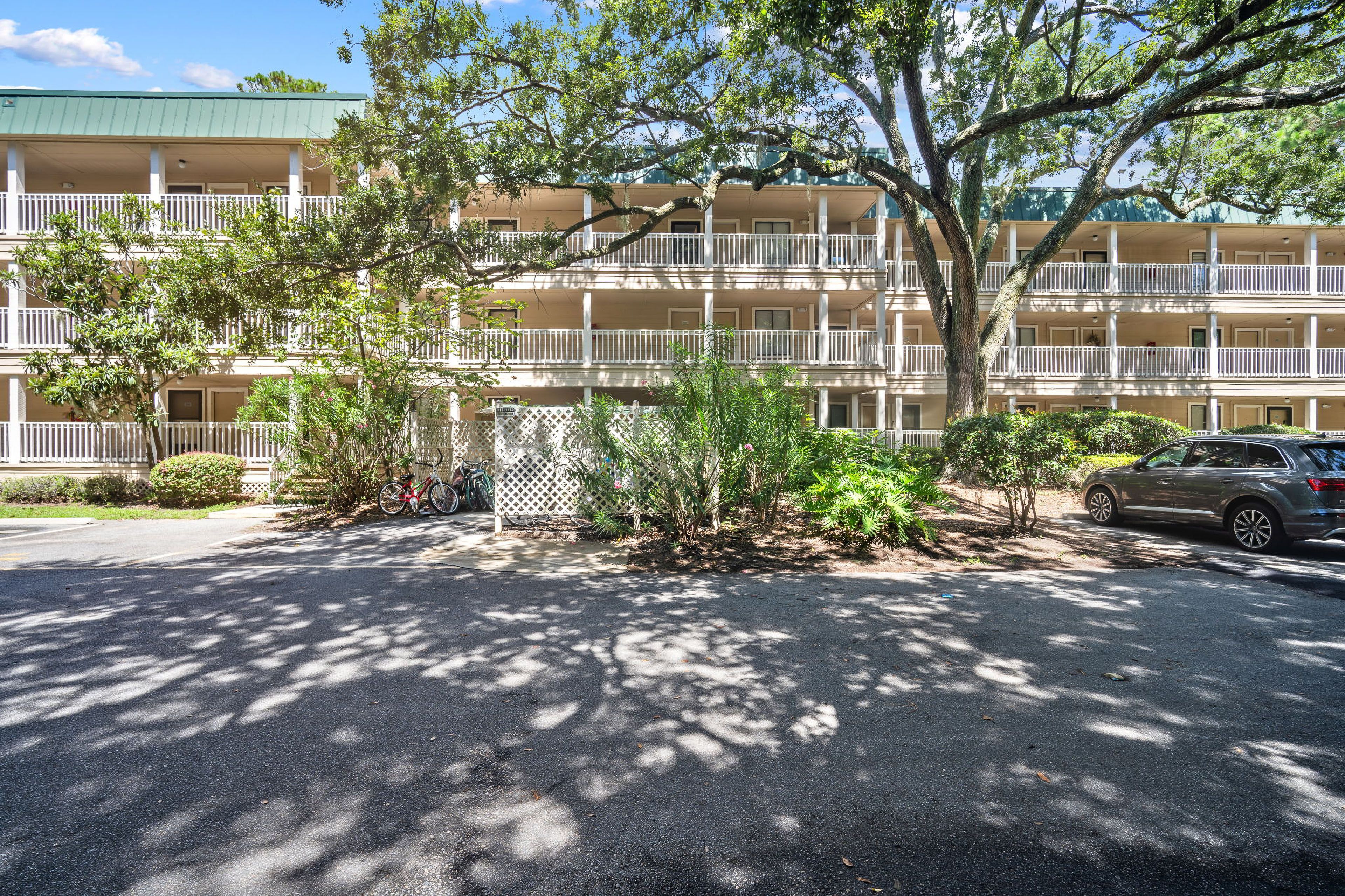 Condo Exterior | Open Community Parking Lot (2 Vehicles) | $20 Per Vehicle Fee