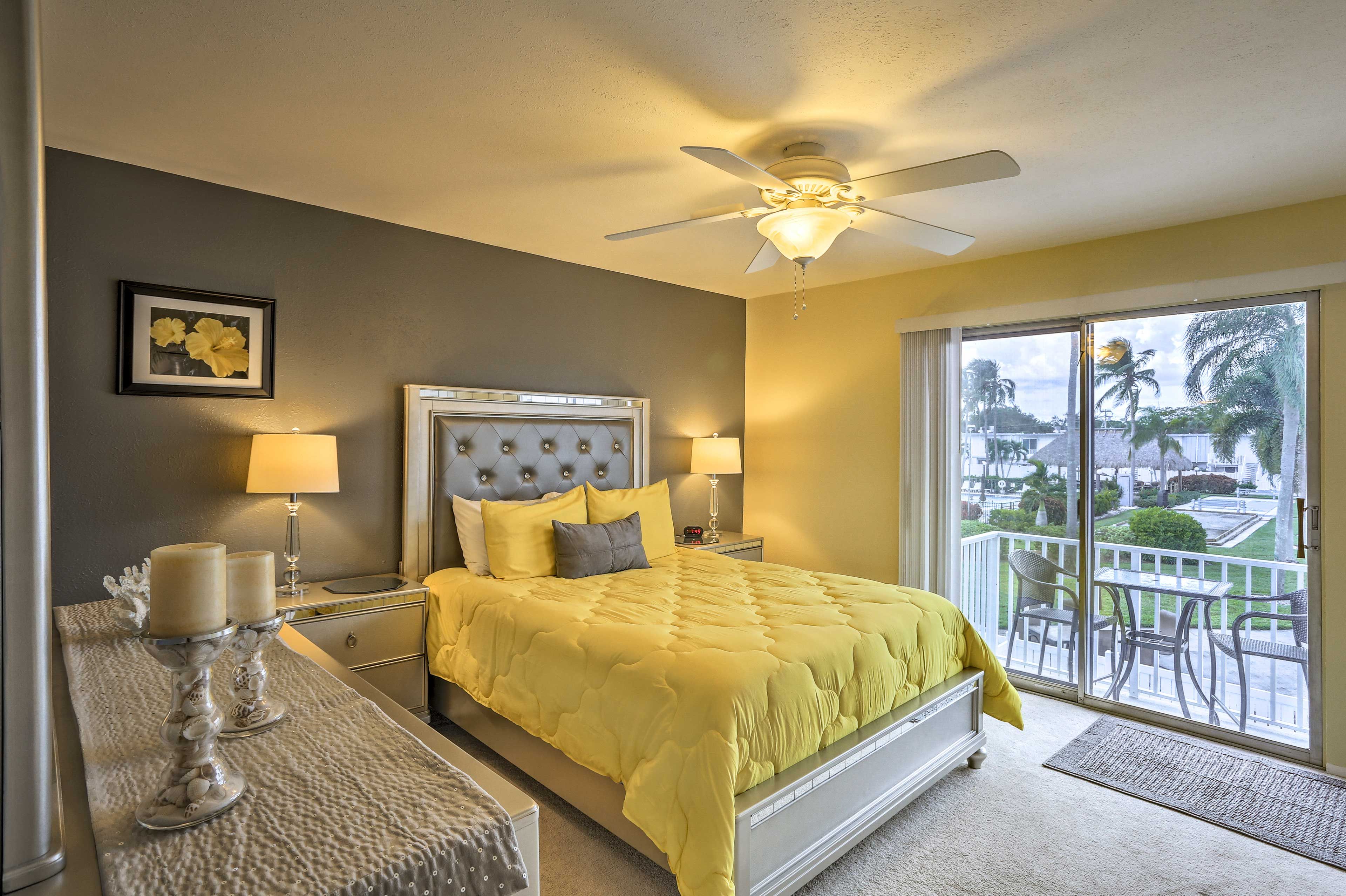 The bedroom suite has a queen bed and access to a private deck.