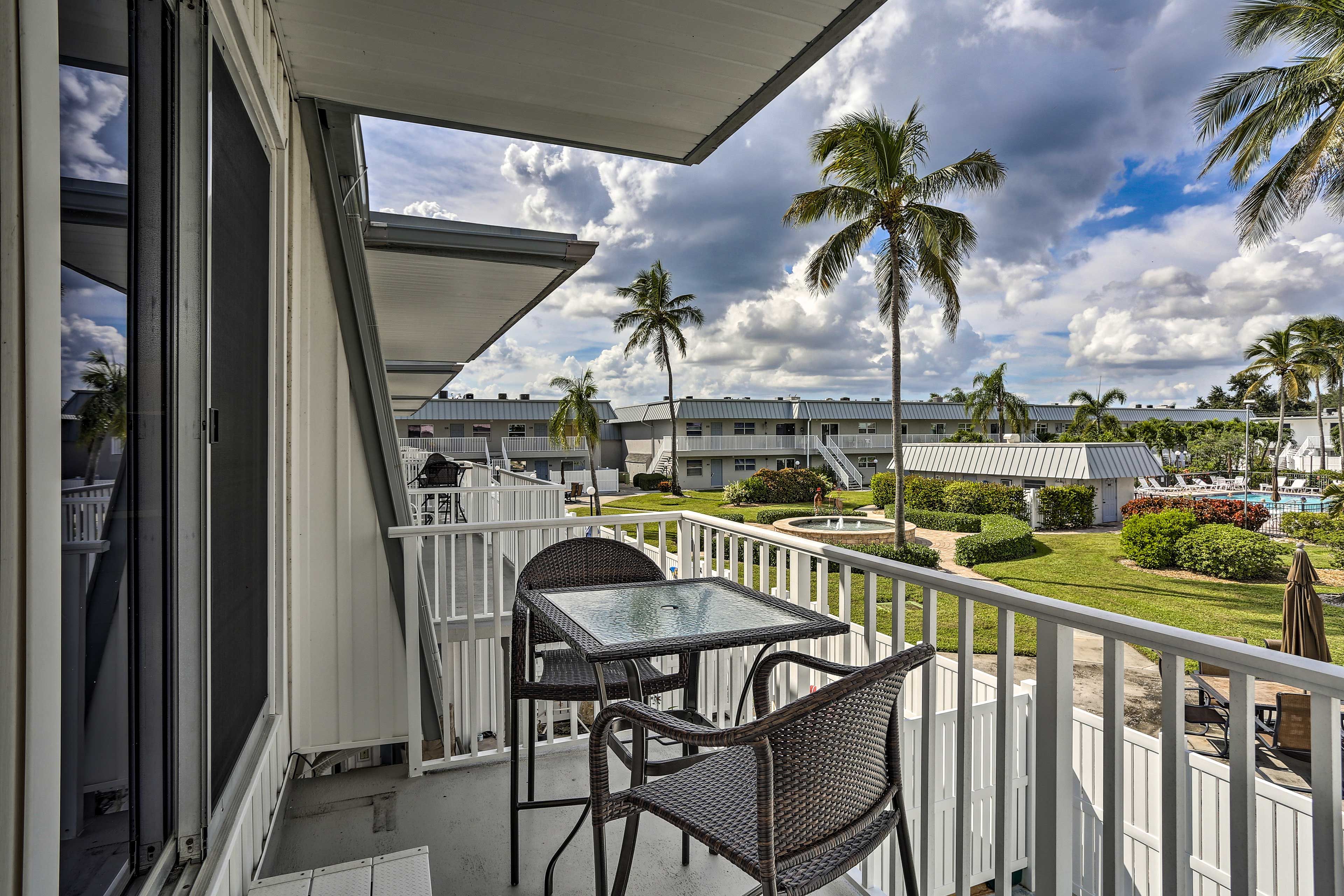 The private deck off the bedroom suite overlooks the pool.