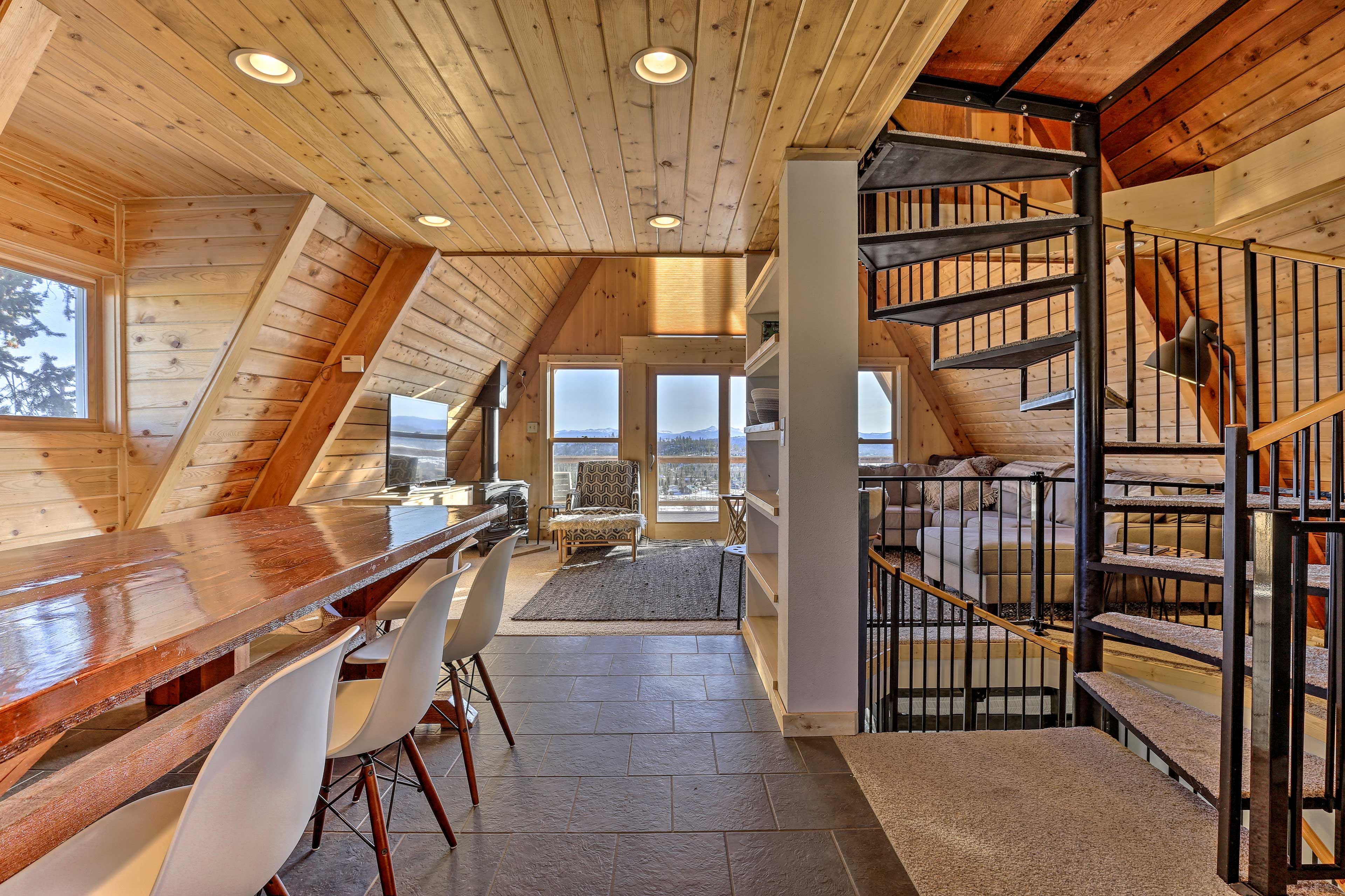 Take in mountain view out the wall of windows as you dine.