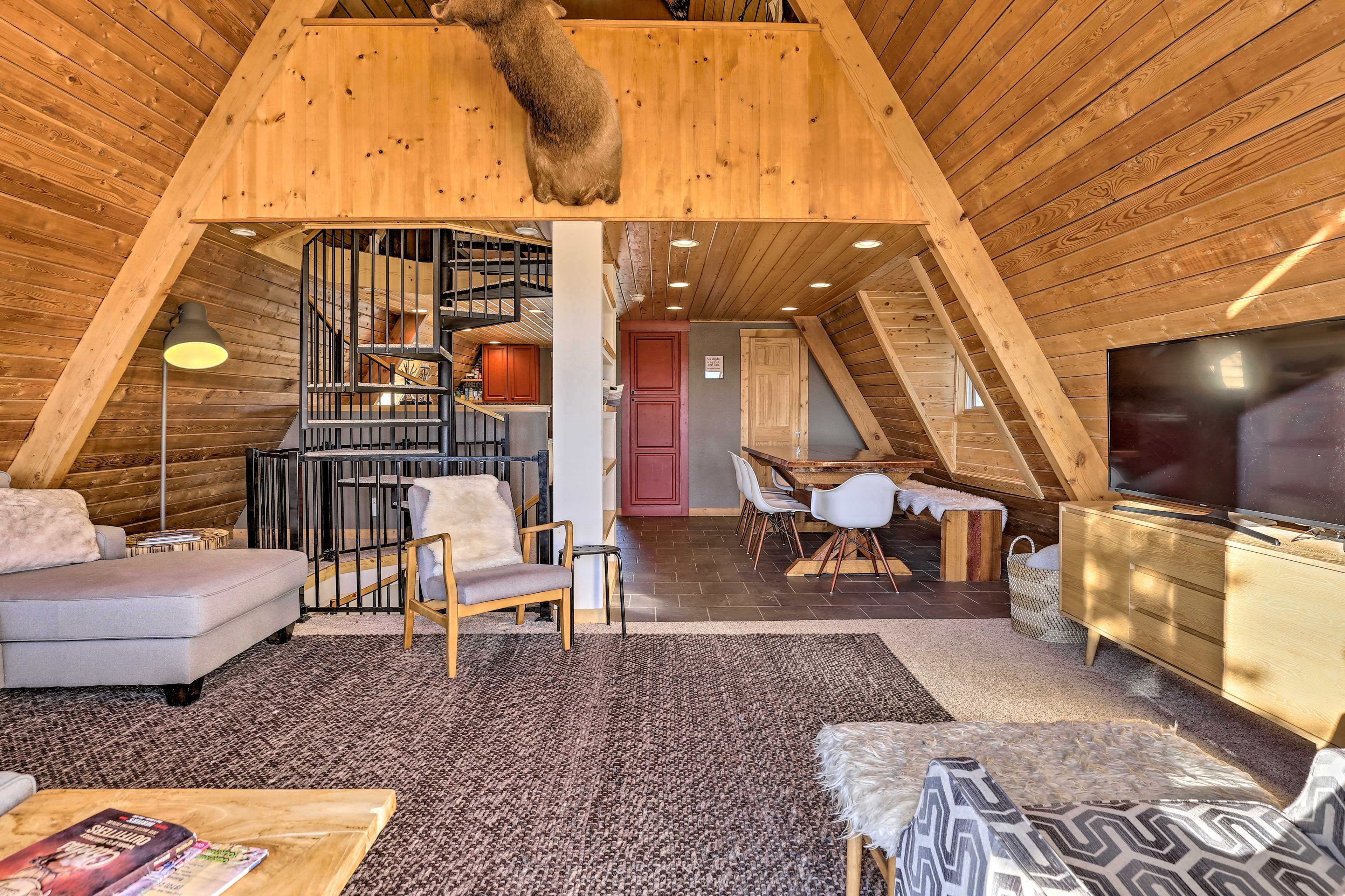 A spiral staircase leads to multiple floors in the home.