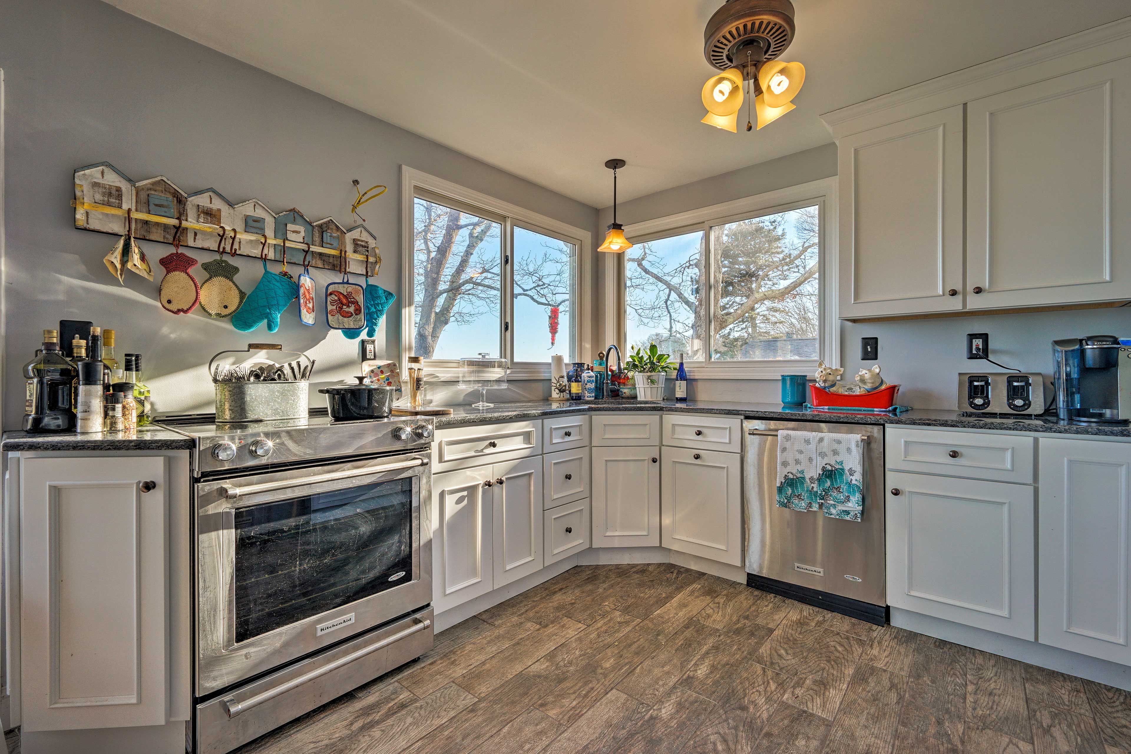 The kitchen is fully equipped with stainless steel appliances.