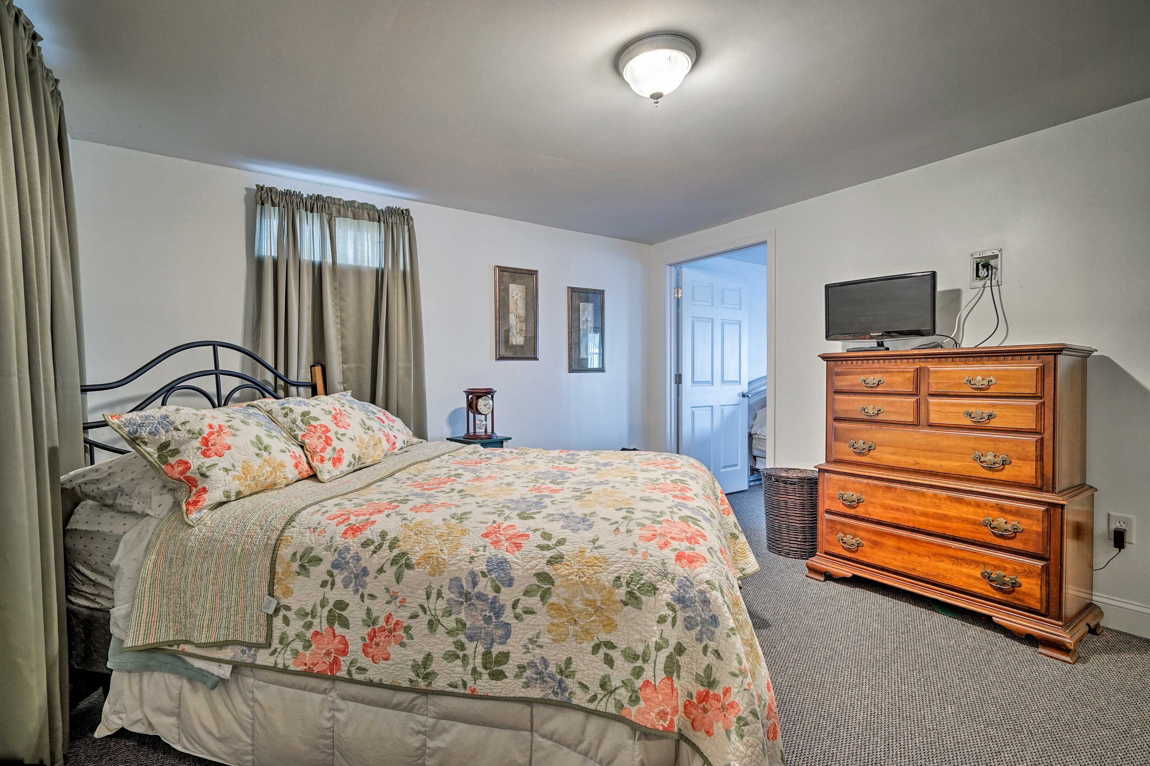 Two guests can sleep comfortably on this queen bed.