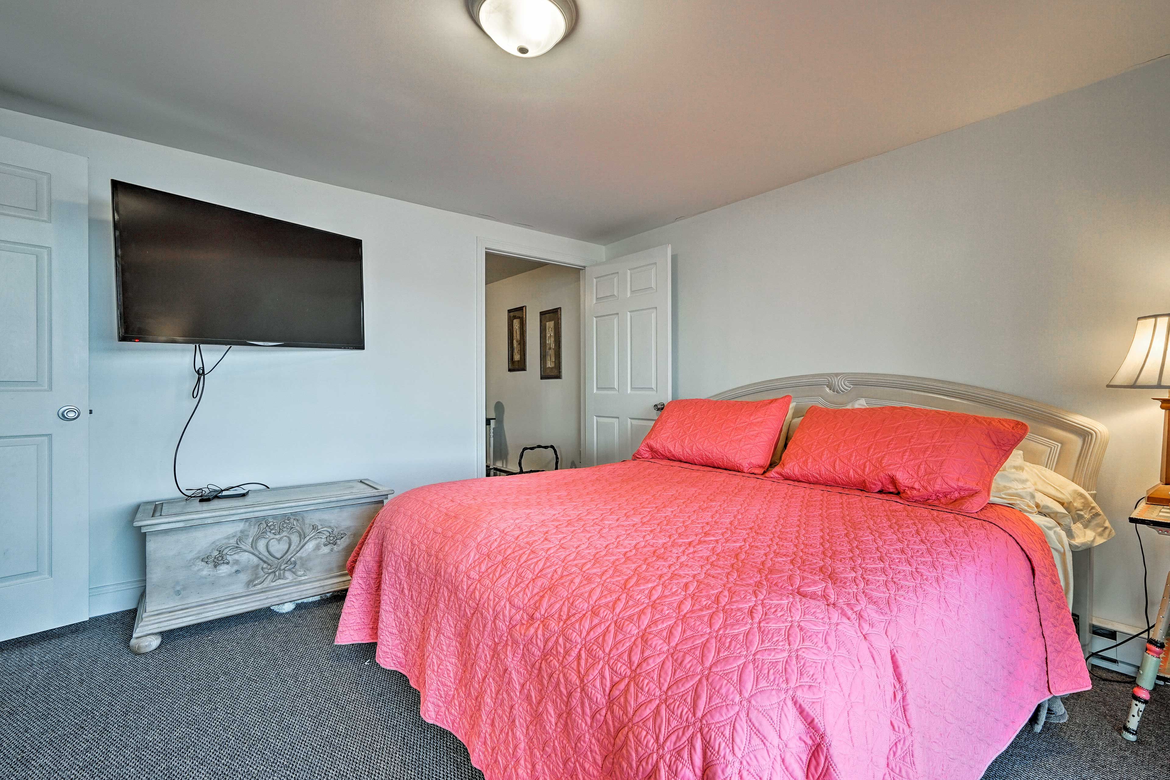 The fourth bedroom boasts a king bed.