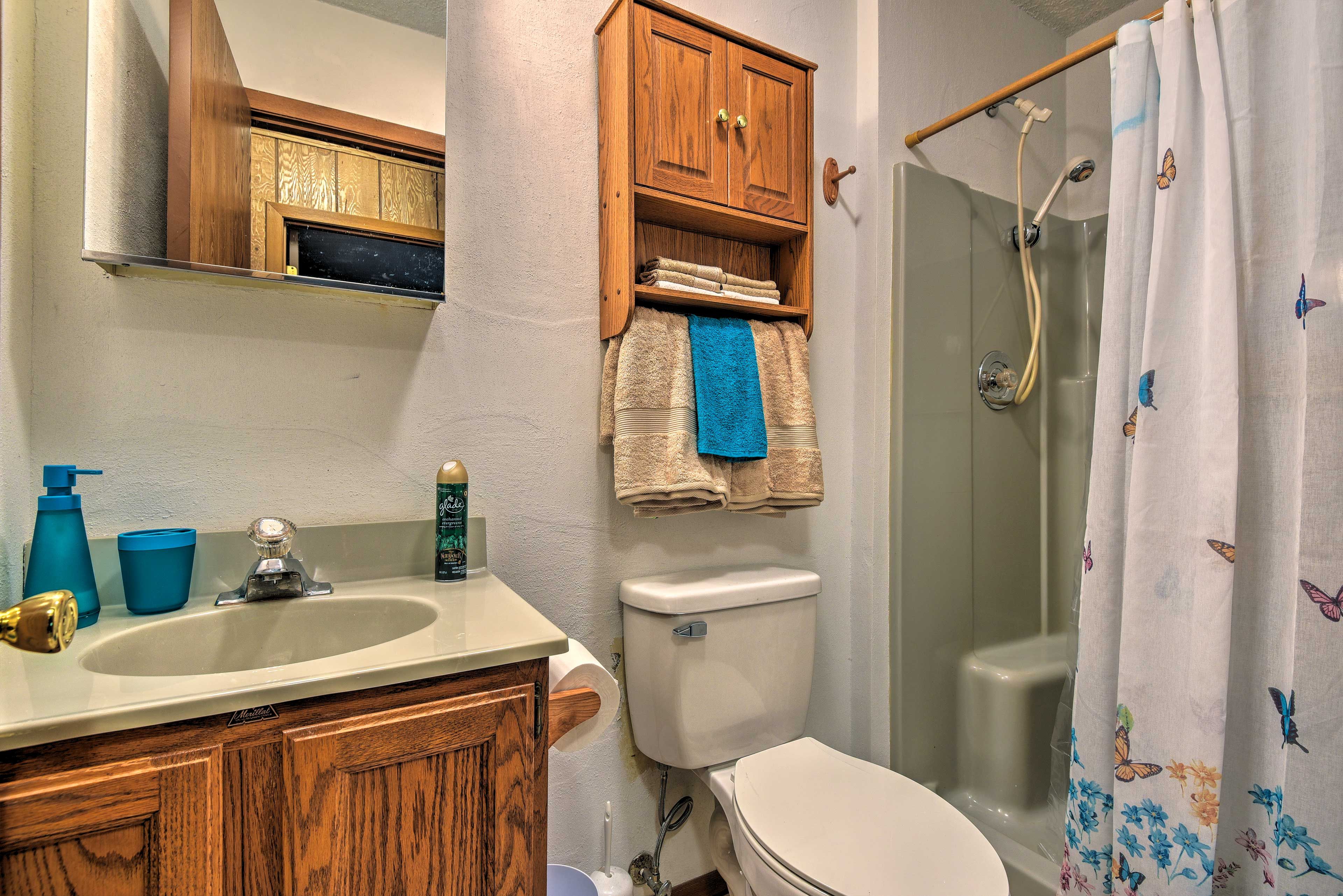 Rinse off in the second bathroom's shower tub combo.