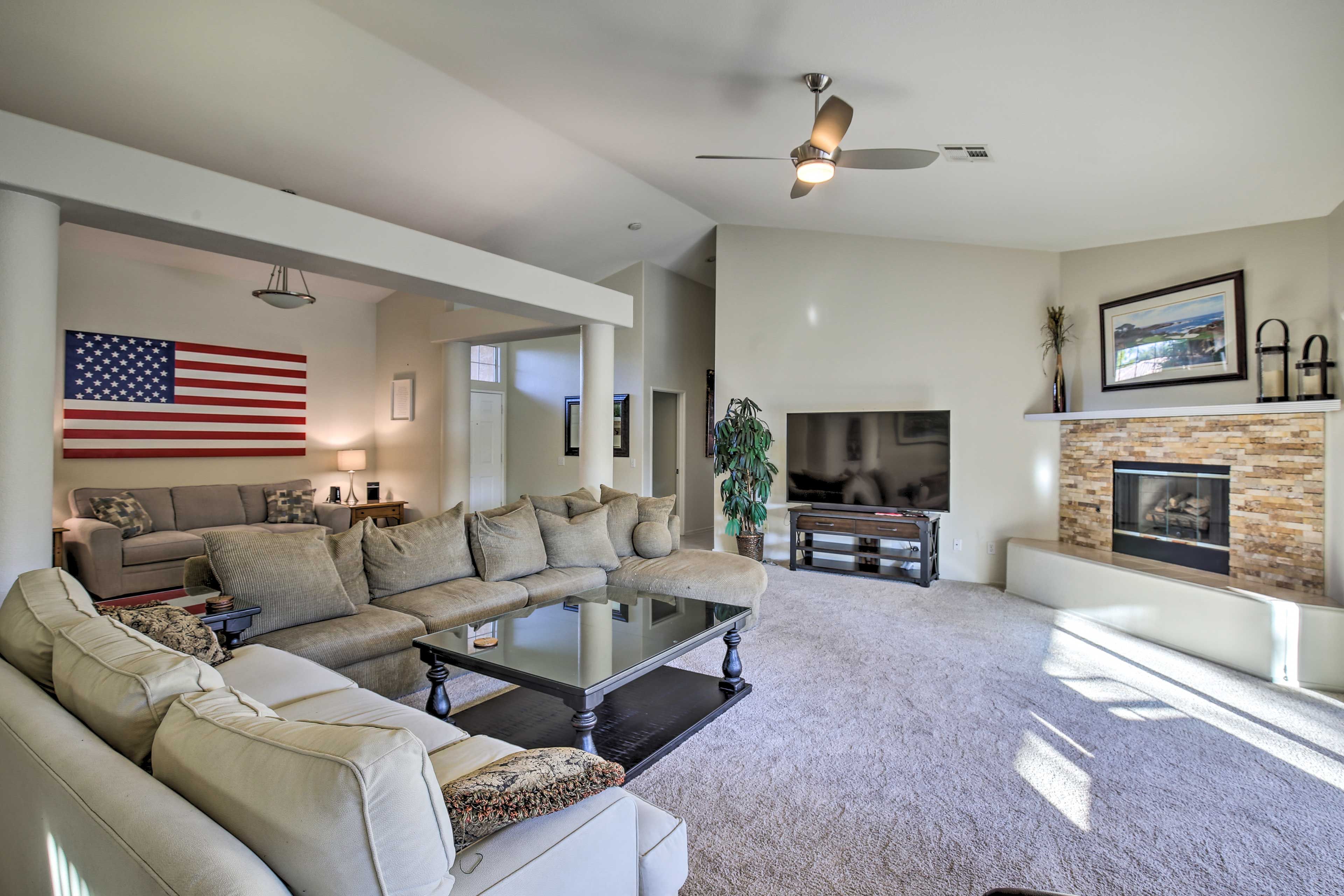 Turn on the flat-screen TV and gas fireplace as you settle into the living room.