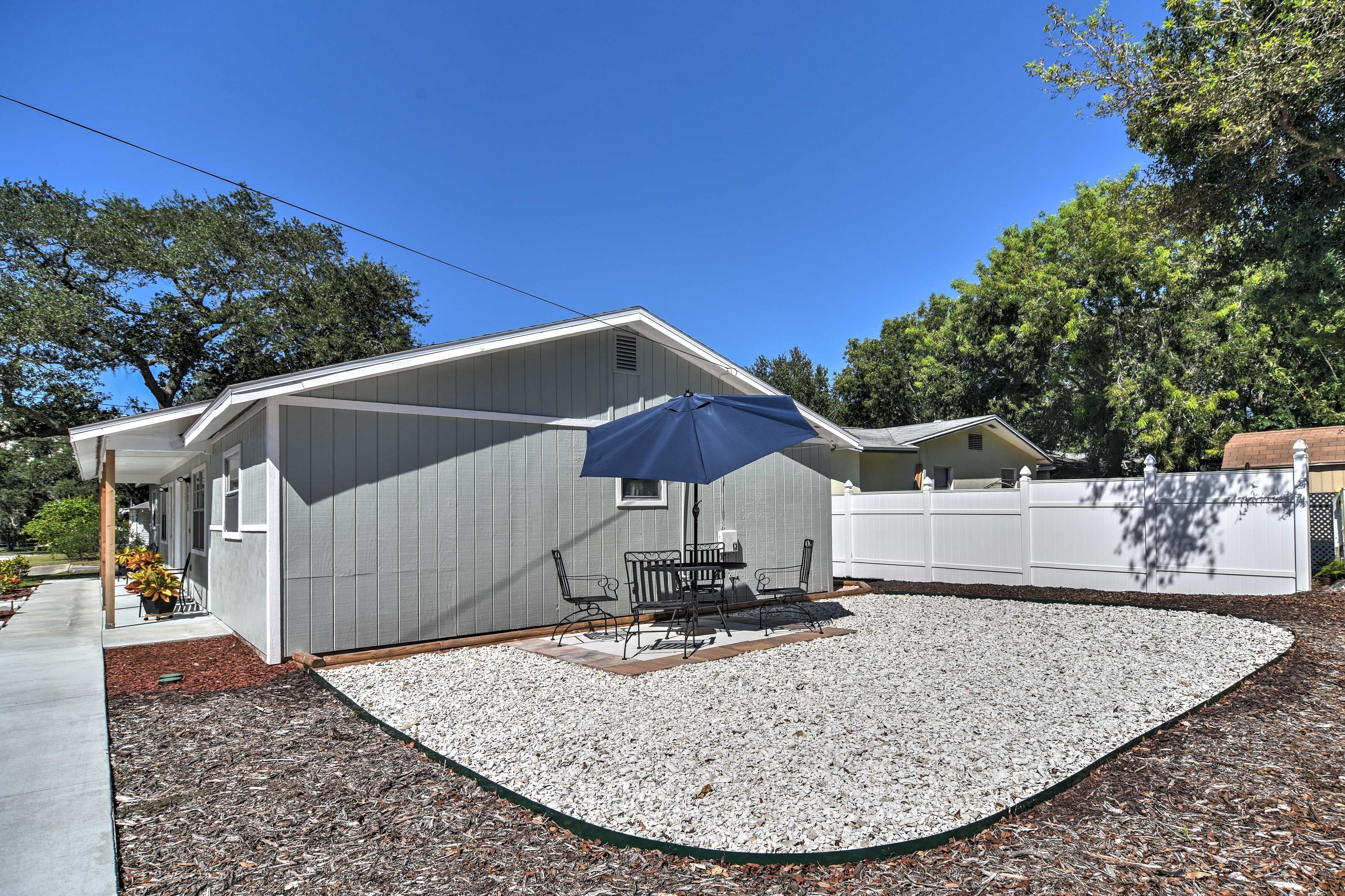 The 4 of you can dine al fresco at this charming patio table!