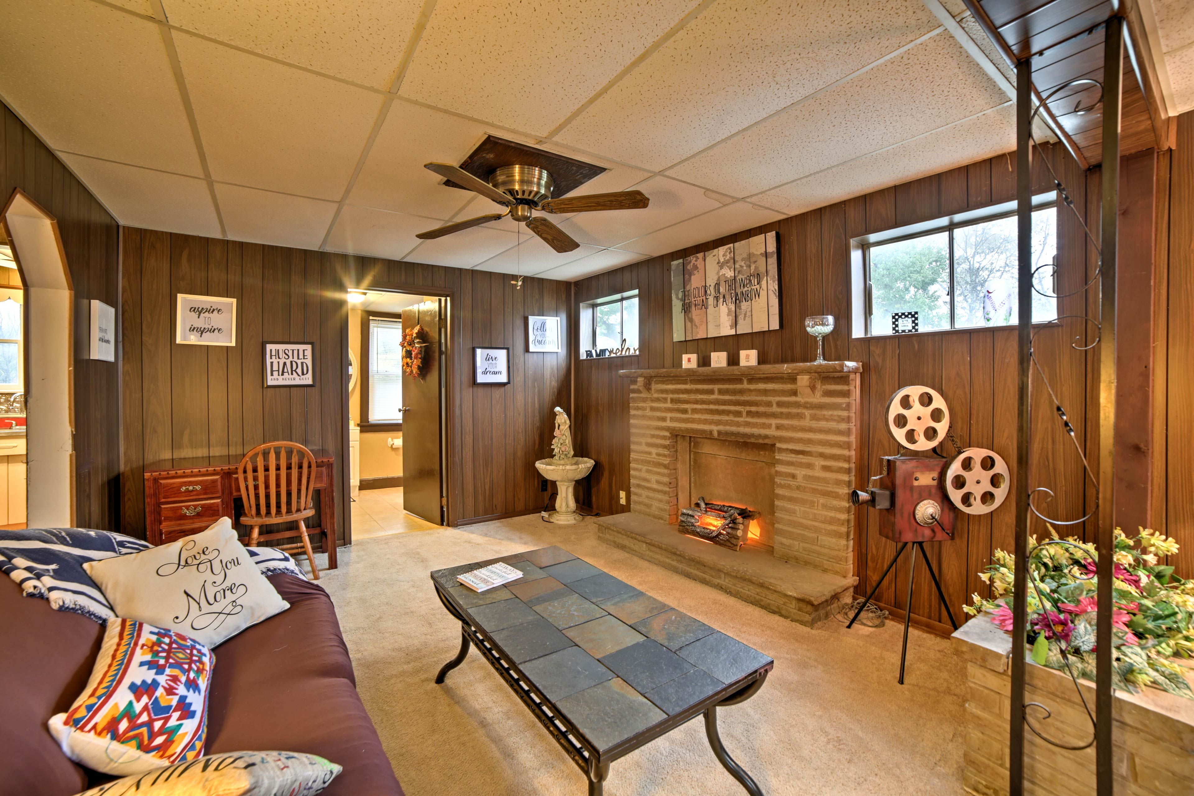 The decorative electric fireplace sets the mood.