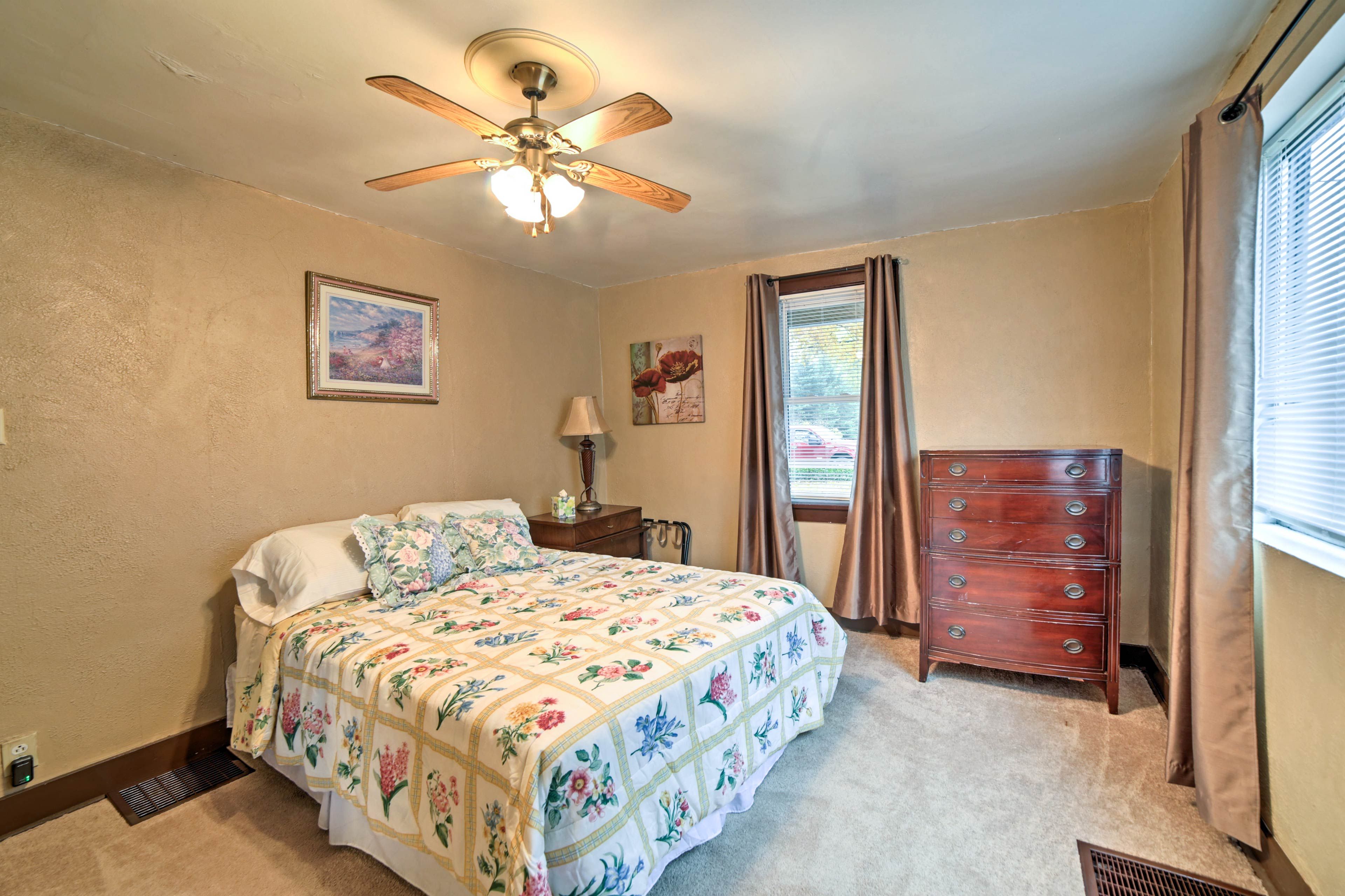 The first bedroom features a queen bed.