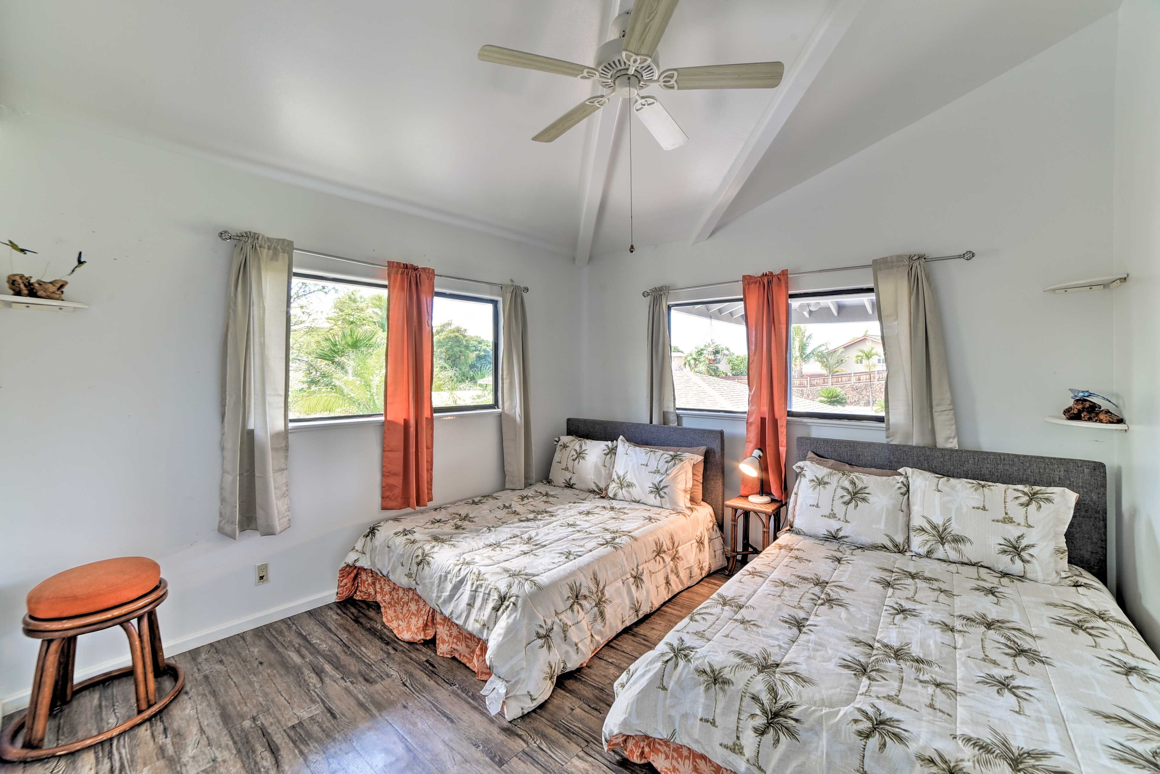 Sleep will come easy in this bedroom featuring 2 full beds.
