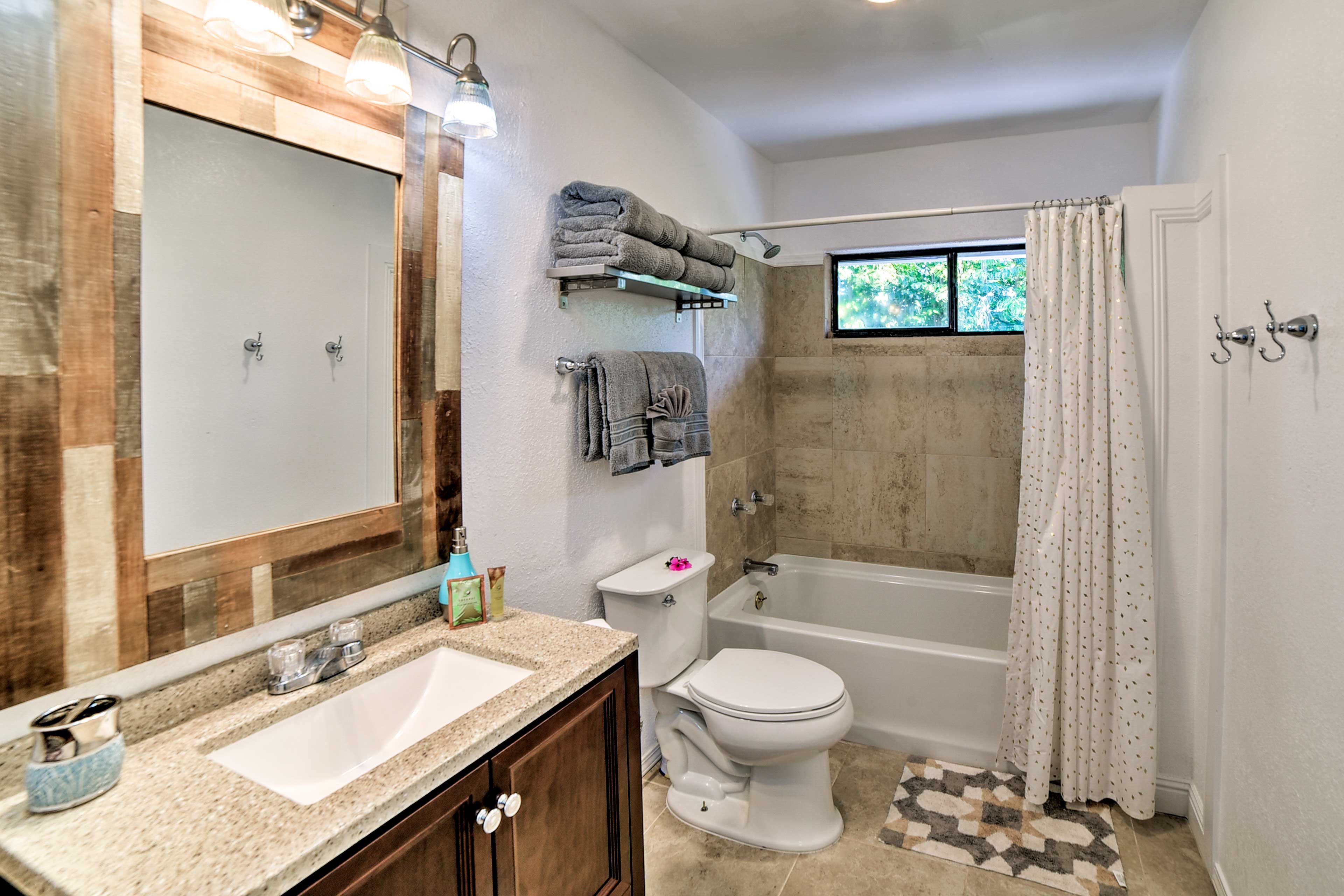 Freshen up in the full bathroom with a shower/tub combo.