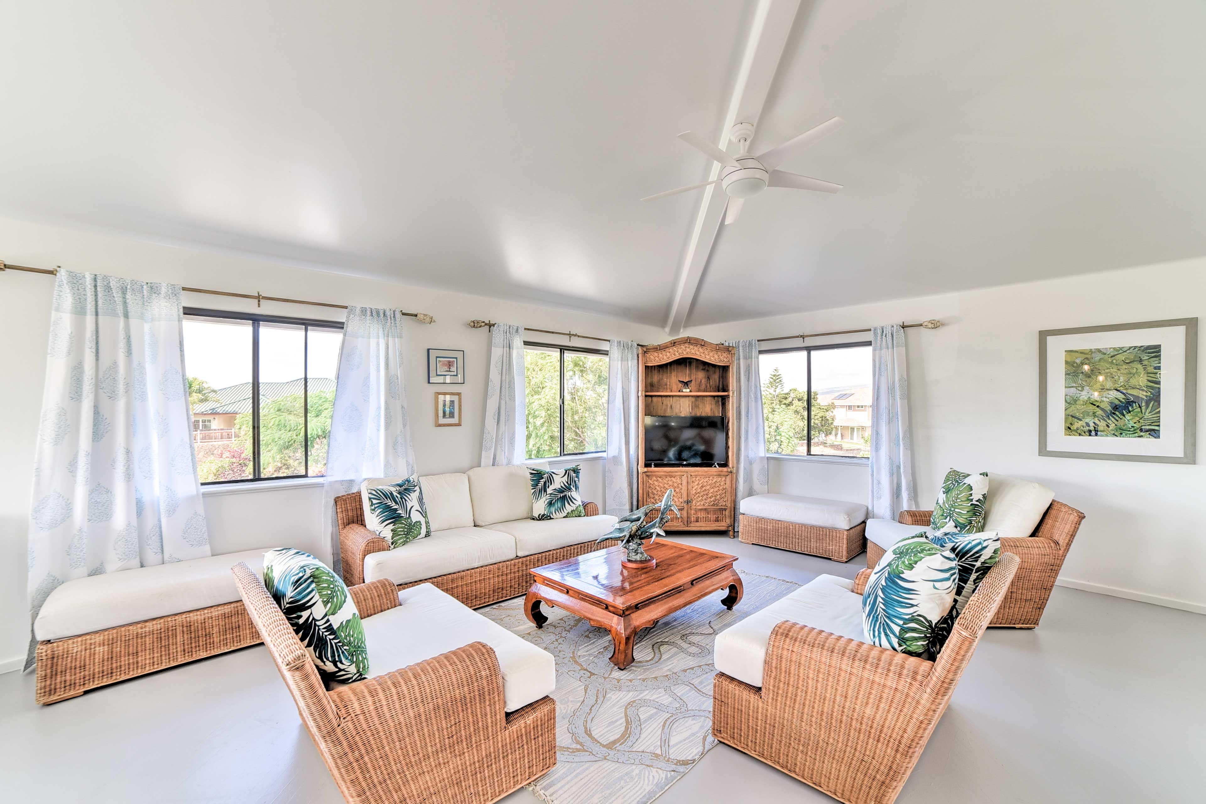 Natural light illuminates the interior of this open and airy abode.