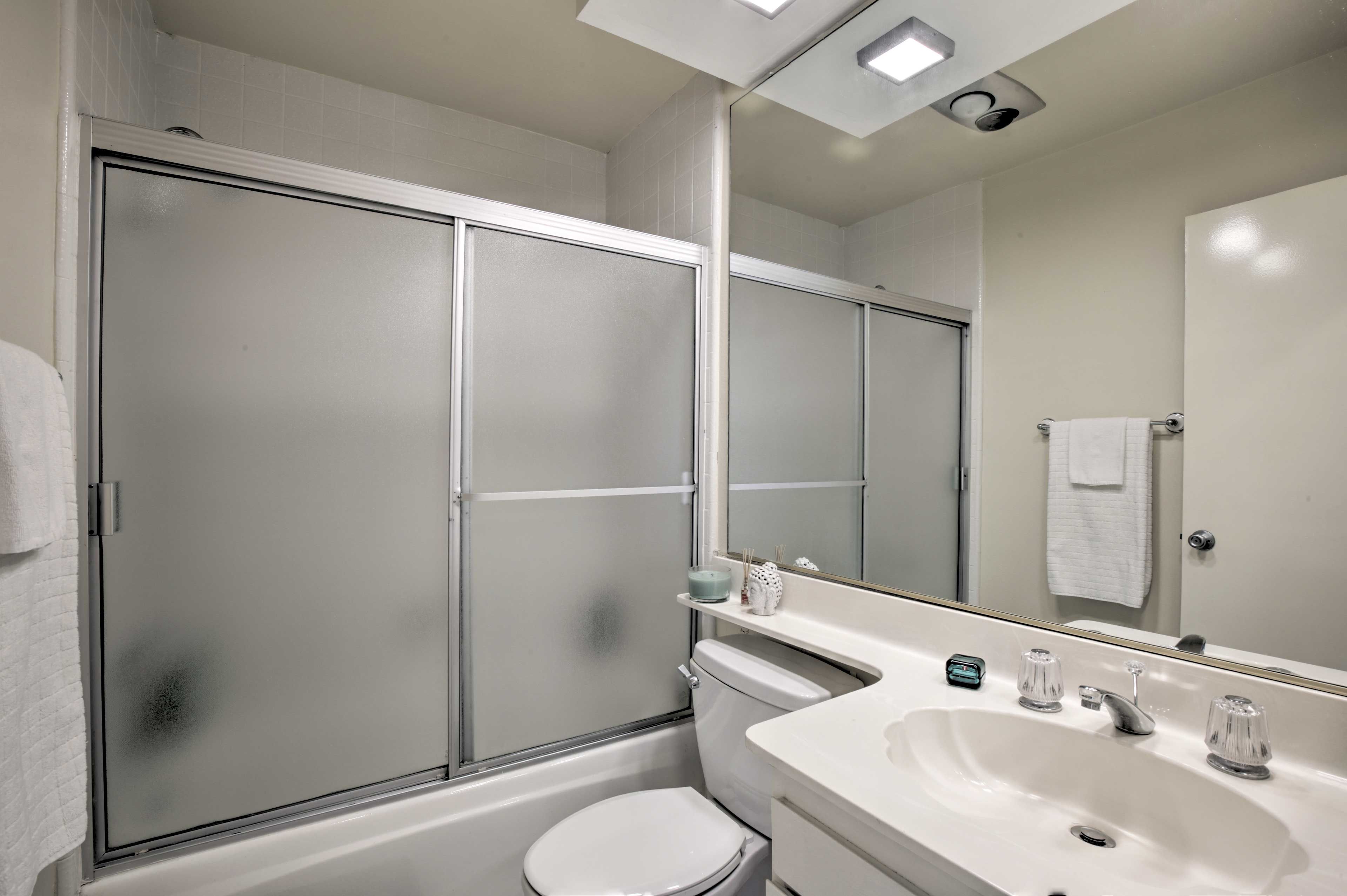 Rinse off the day in the shower/tub combo.