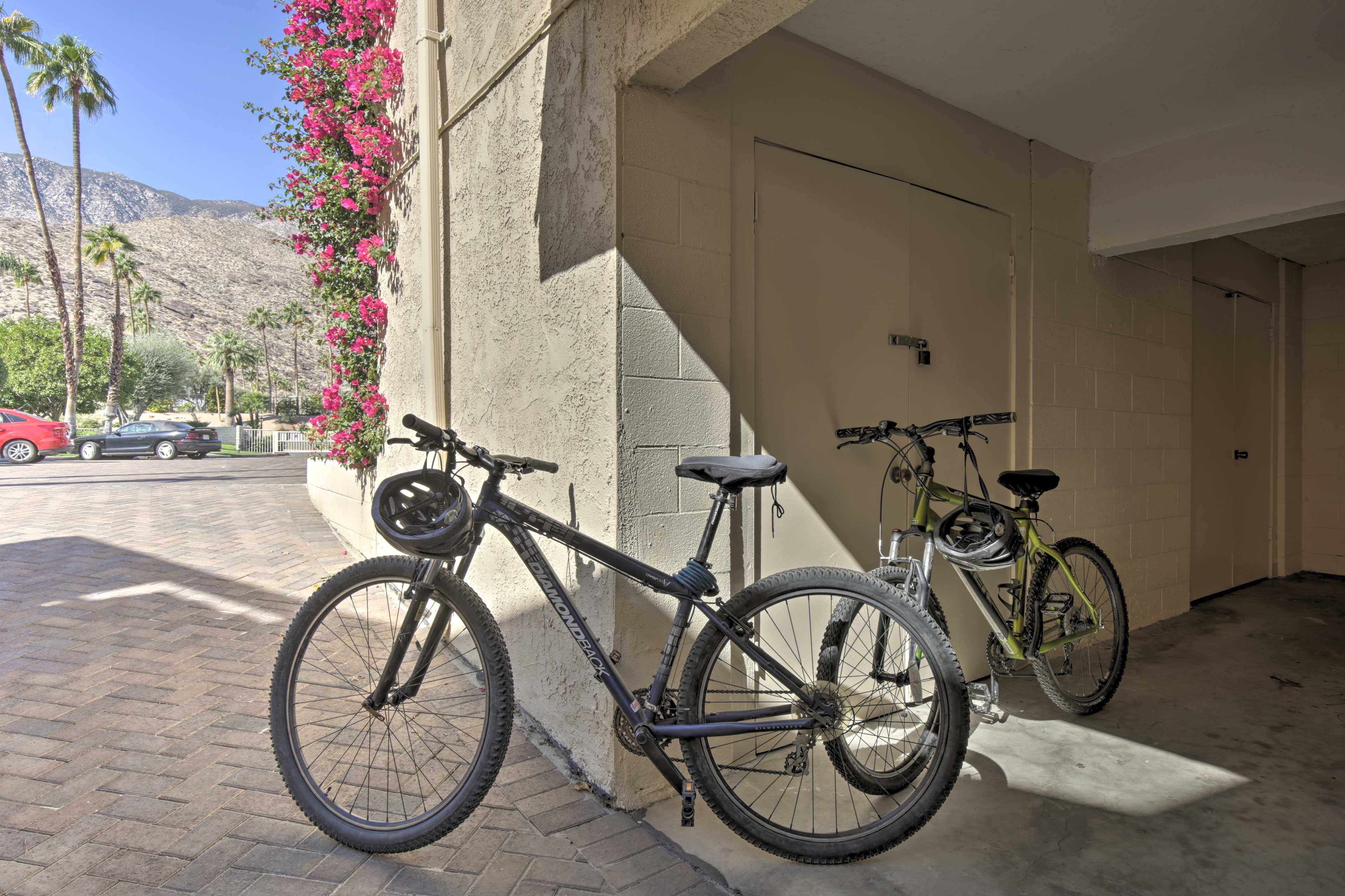 There are 2 mountain bikes and 2 tennis rackets available for use.