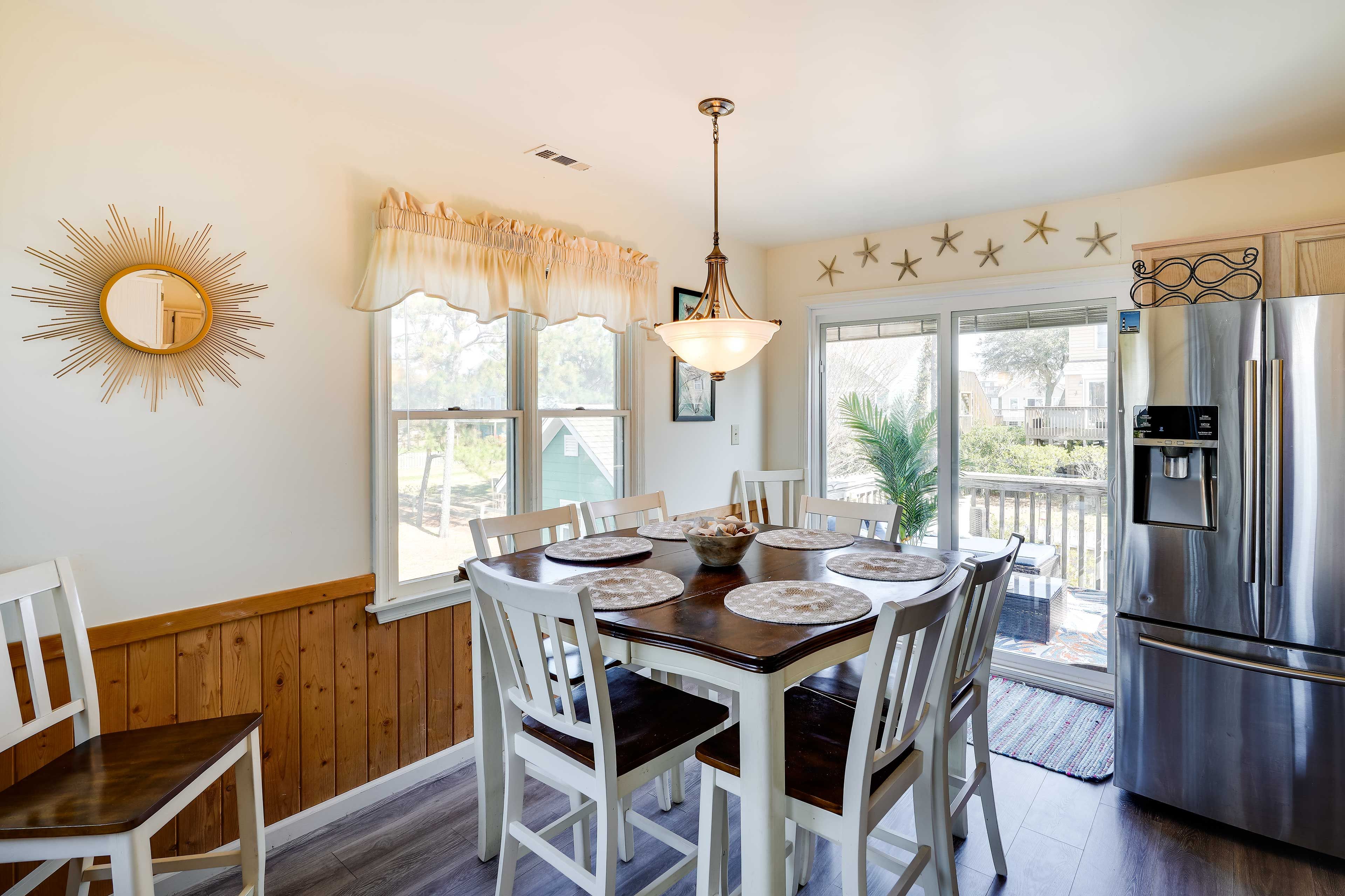 Dining Area | Dishware/Flatware | Free WiFi | Furnished Balcony Access