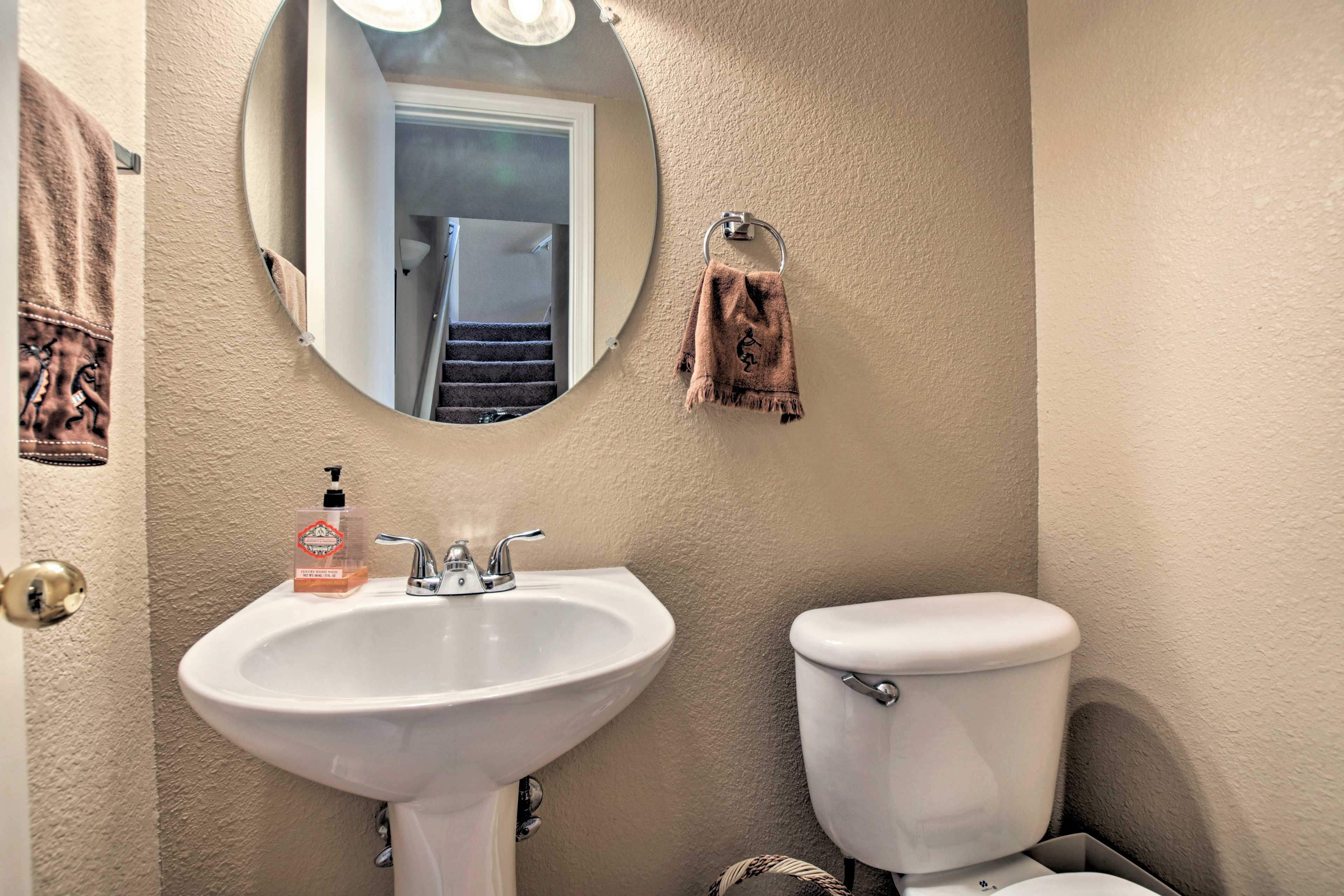Wash your hands before dinner in this half bath.
