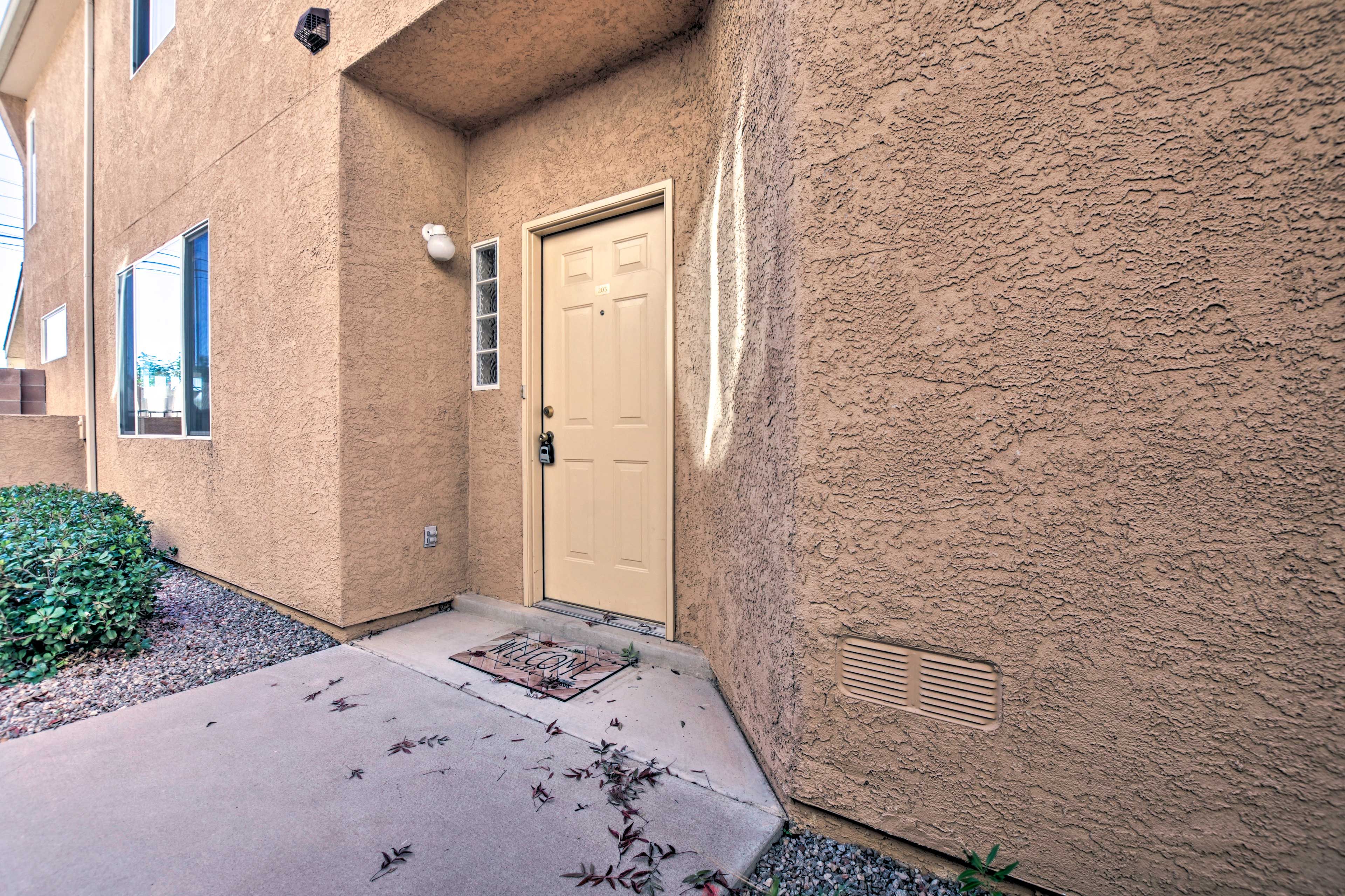 Enter this adobe-style condo to begin your Albuquerque adventure!