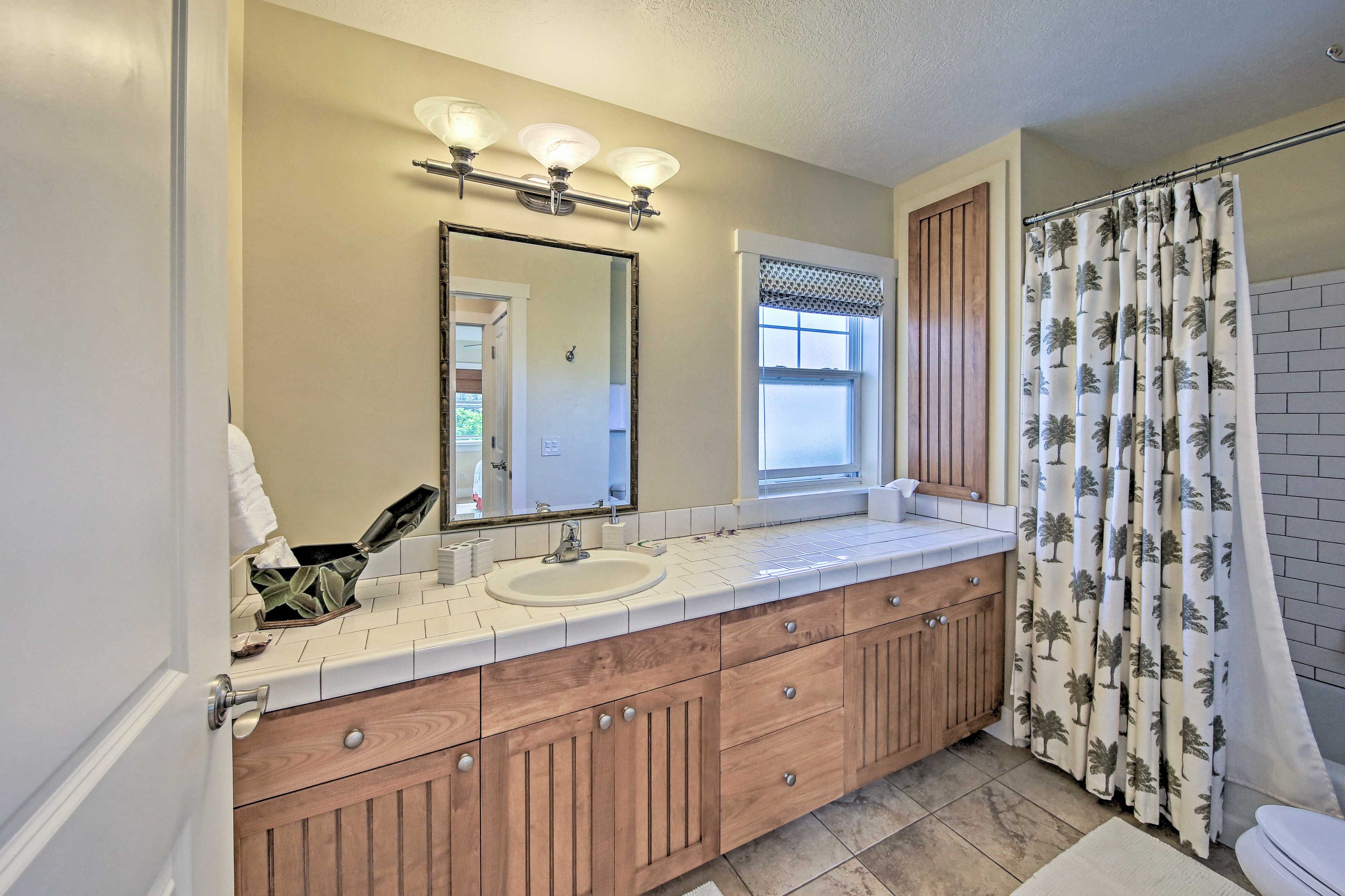 The final bathroom offers a shower/tub combo.