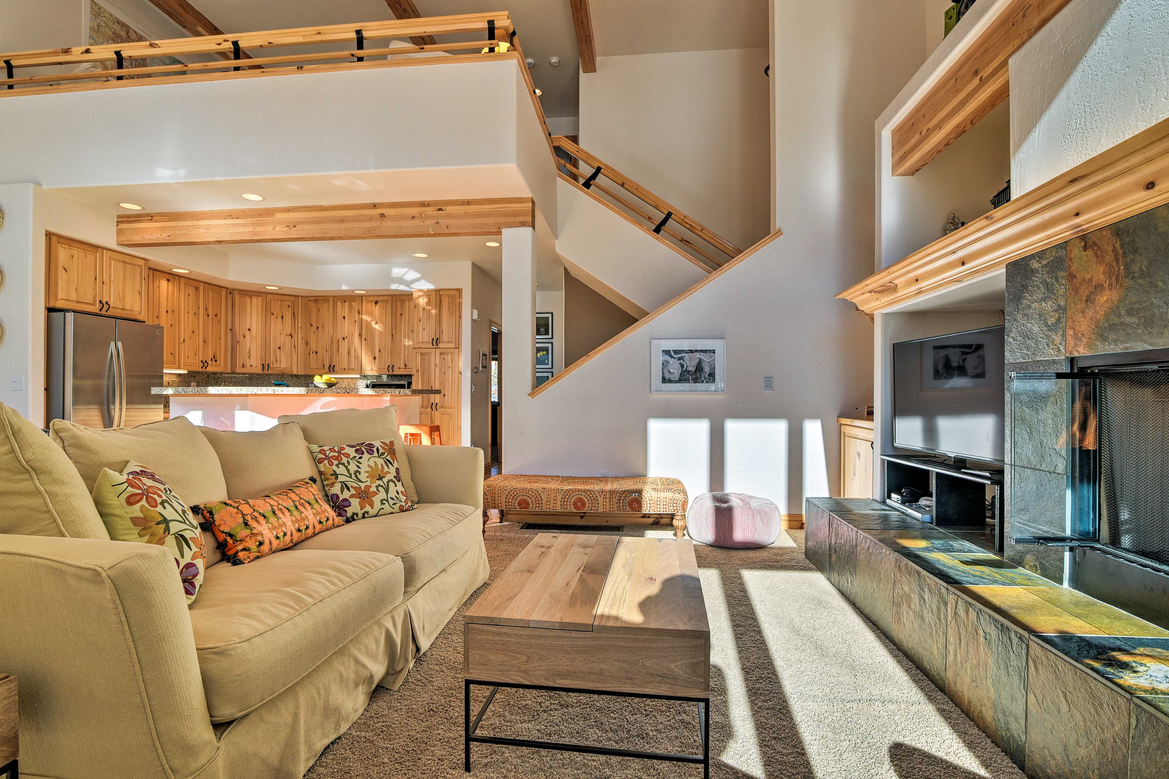 High ceilings and an open floor plan highlight the space.