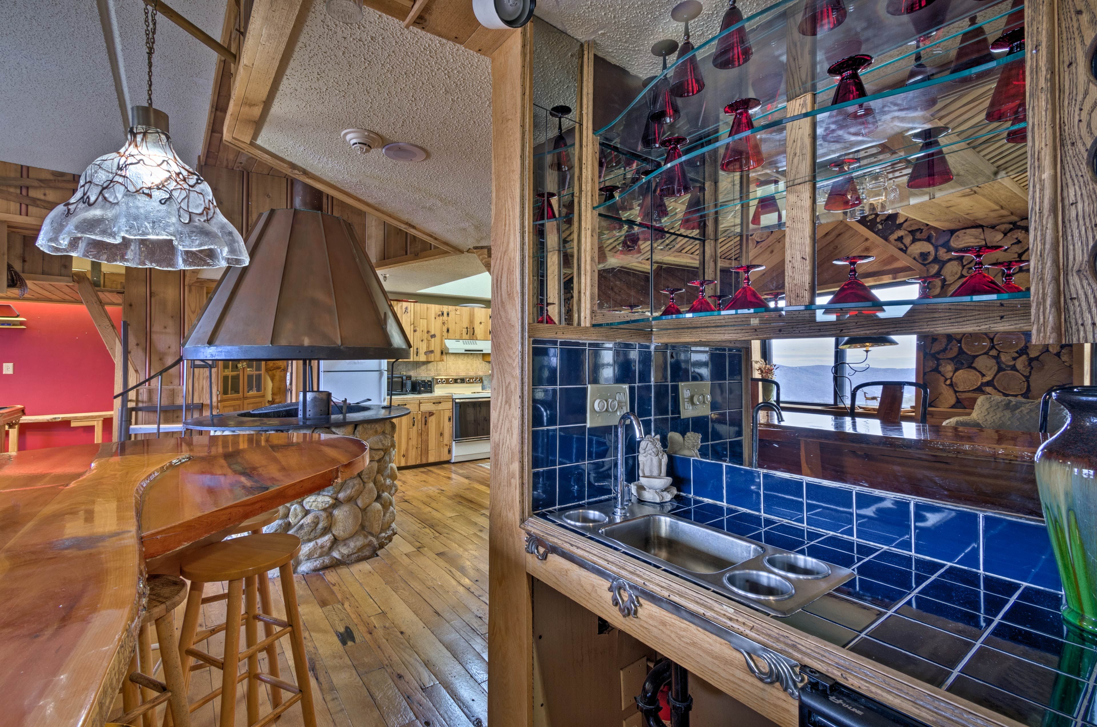 Show off your mixologist skills at the colorful wet bar!