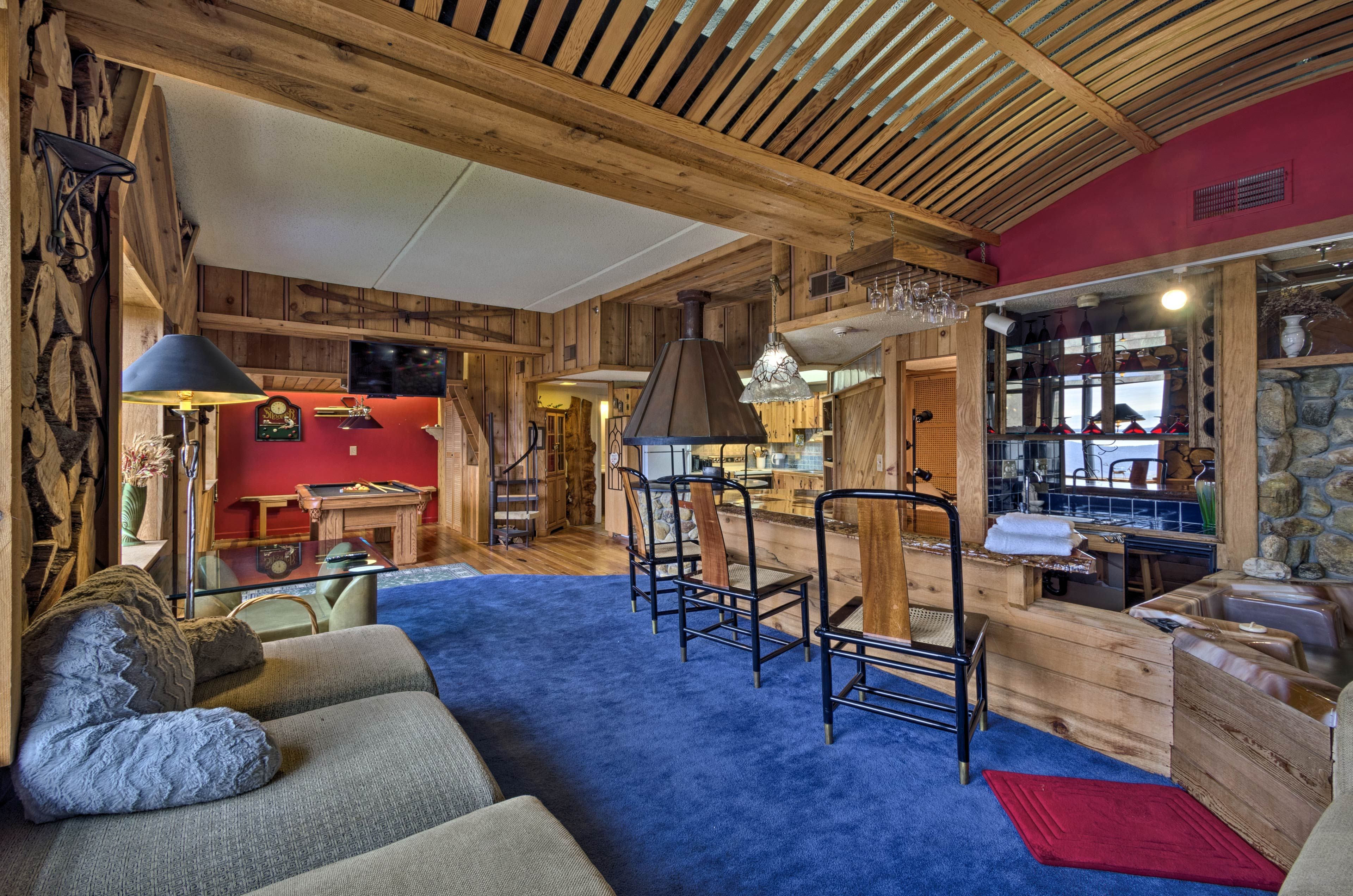 Lounge on the couch while watching shows on the flat-screen Smart TV with cable.
