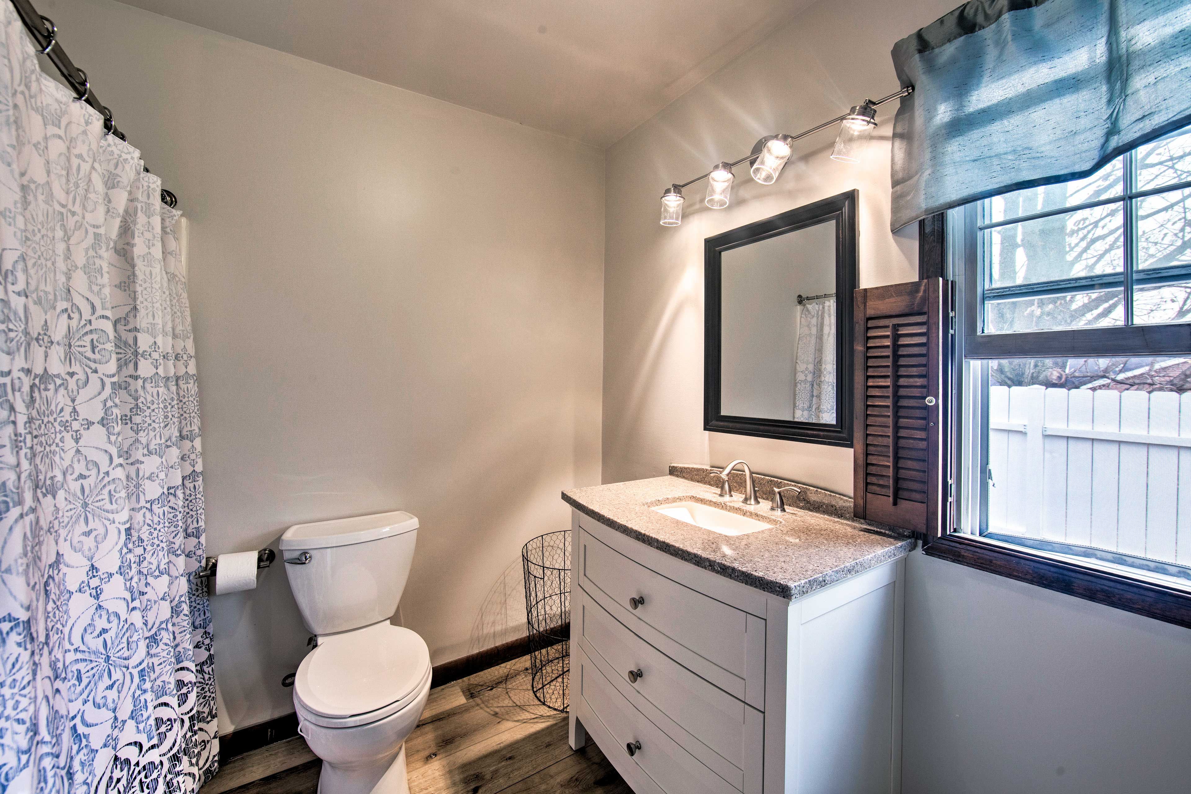 Rinse off the day in this en-suite bathroom.