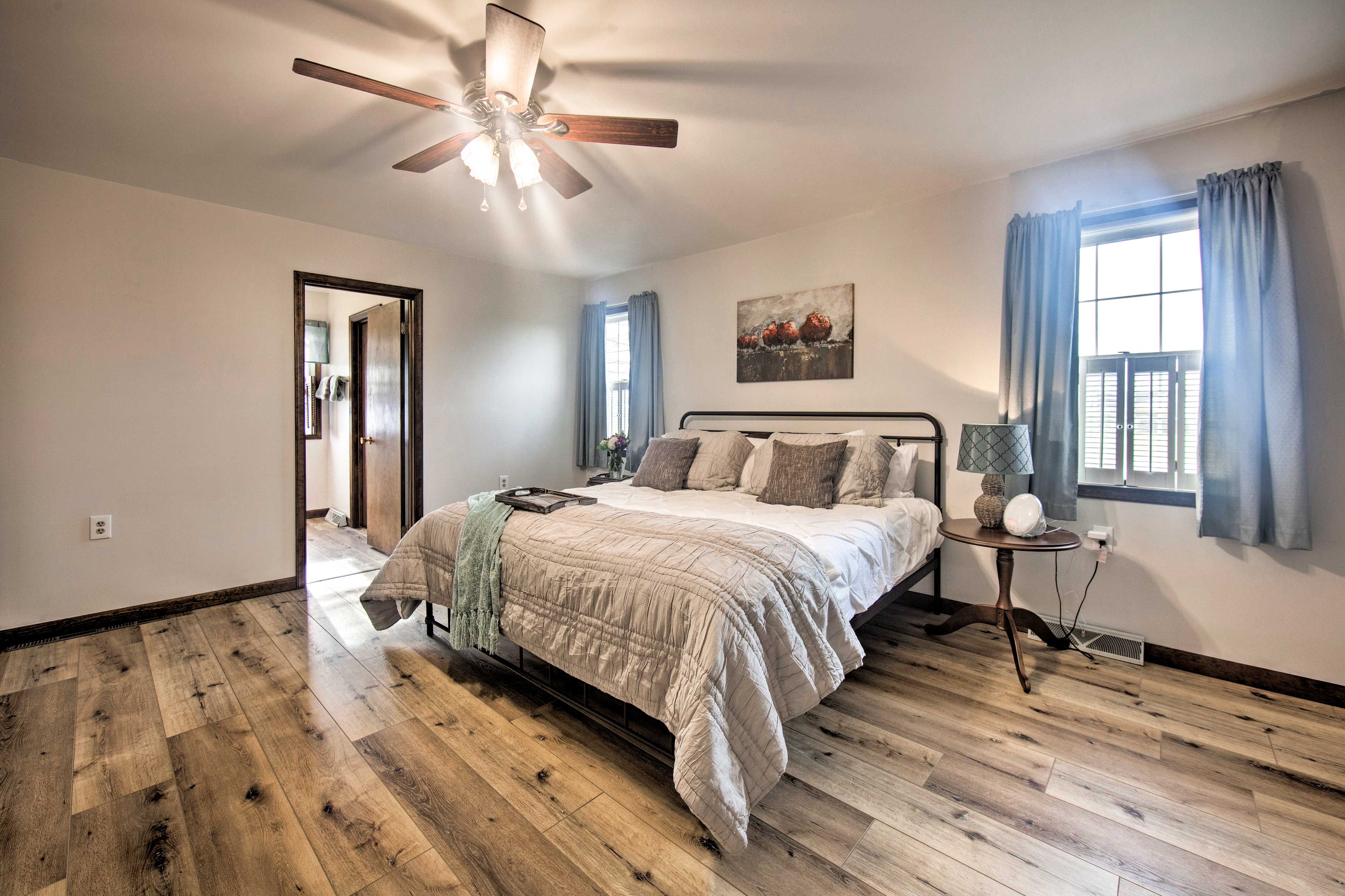 The master bedroom is spacious and bathed in natural light.