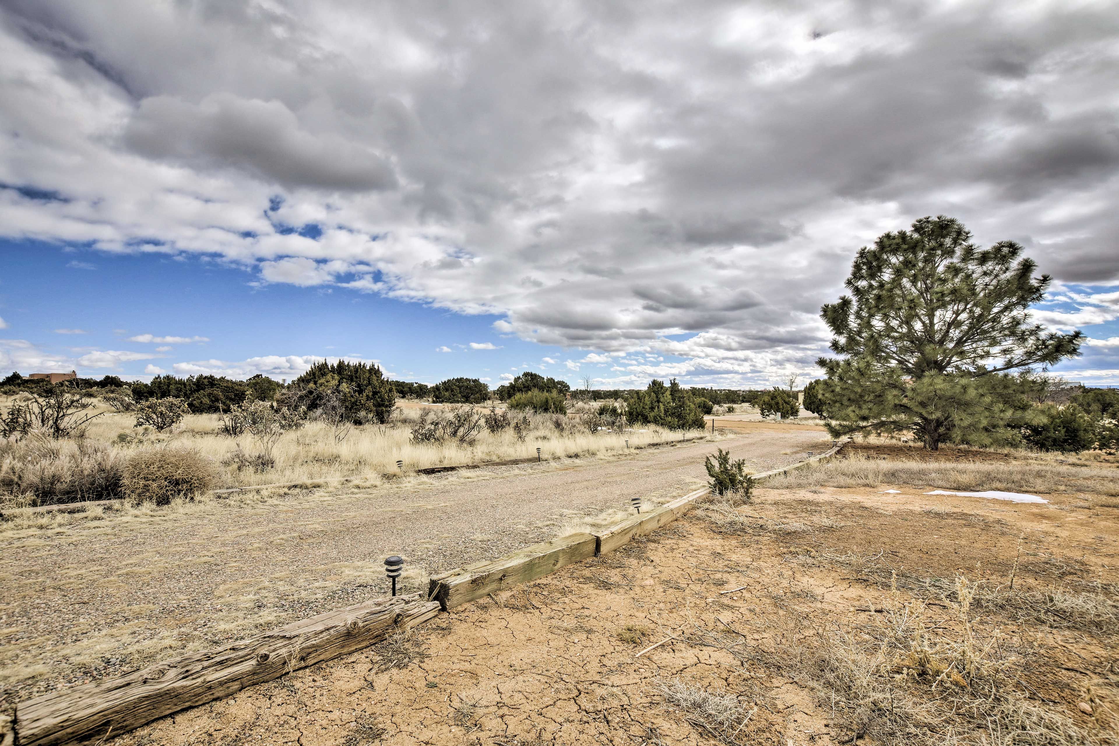 The home is nestled on a little over 1 acre of land, giving a remote experience.