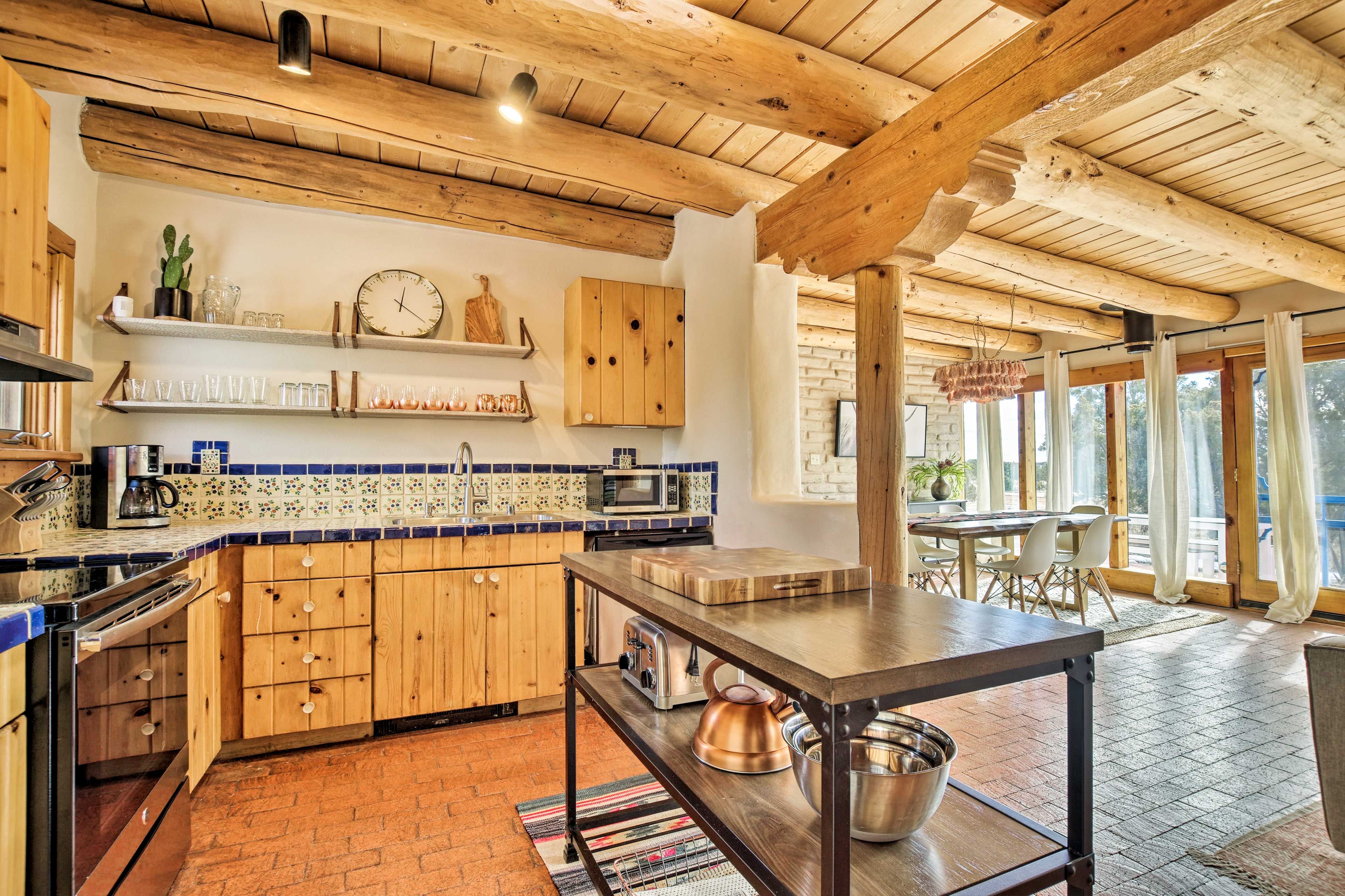 Take in the views from the wall of windows while you meal prep.