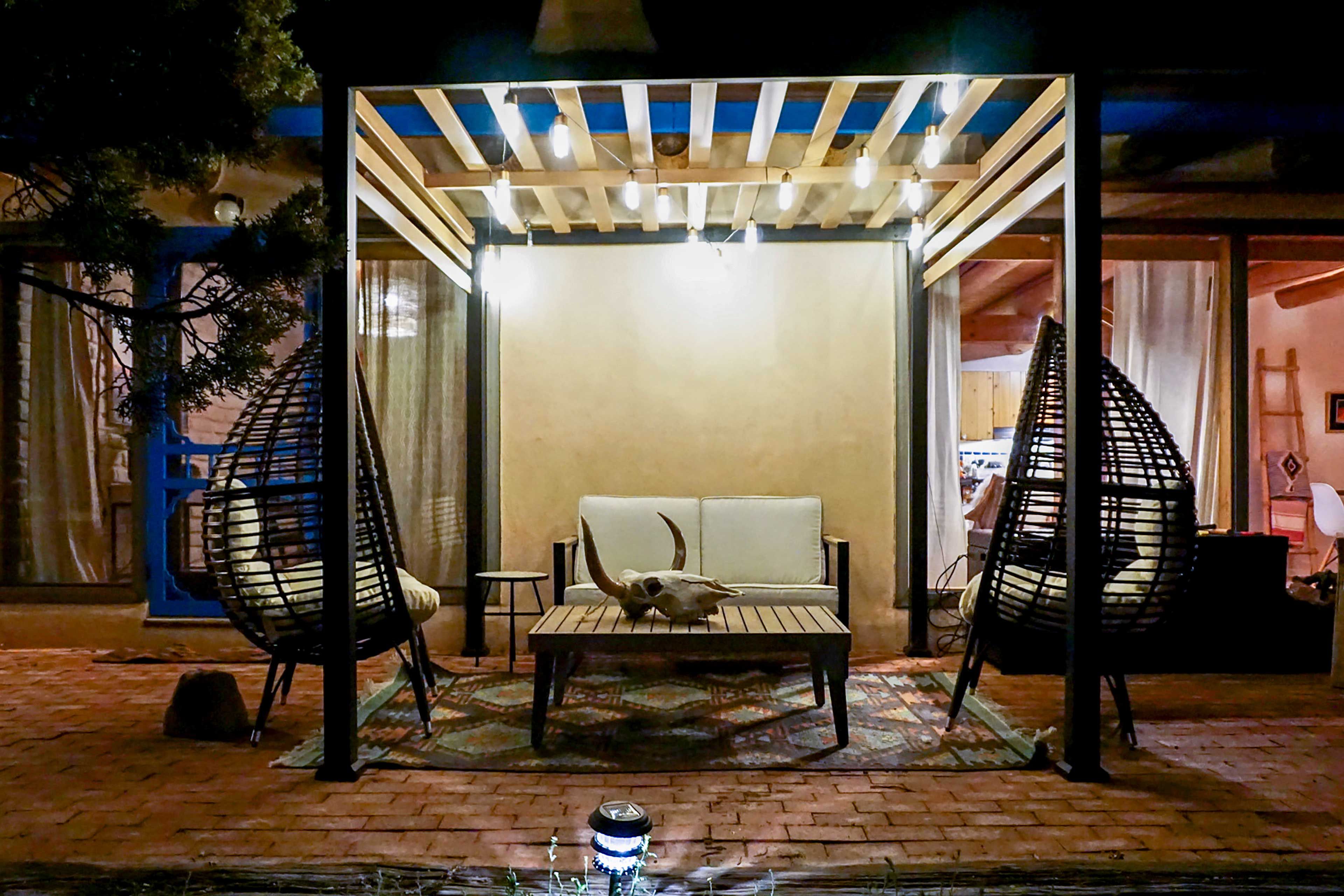 Unwind with cocktails on the patio after the sun sets.