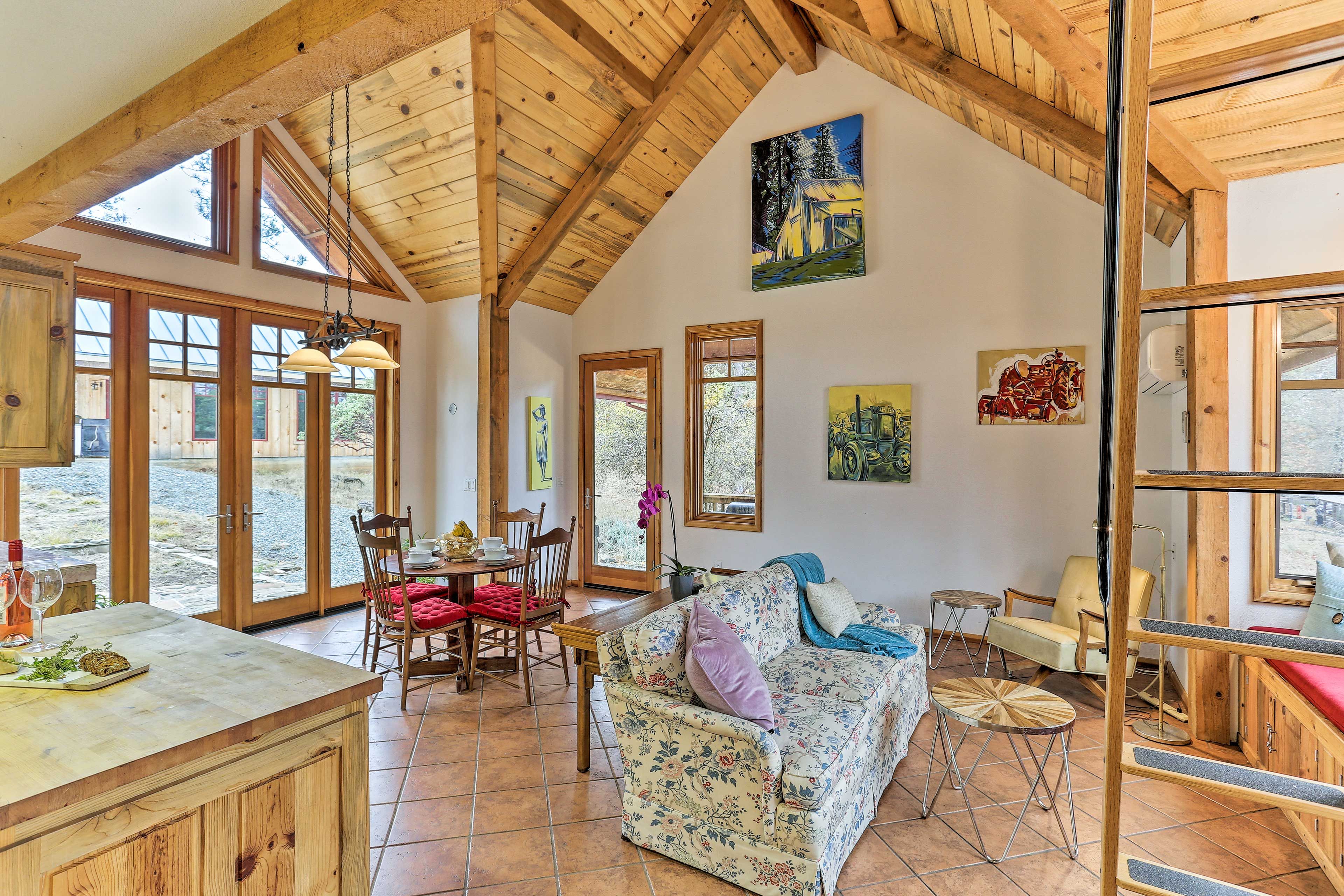 The interesting floor plan features minimalist decor, channeling a unique vibe.