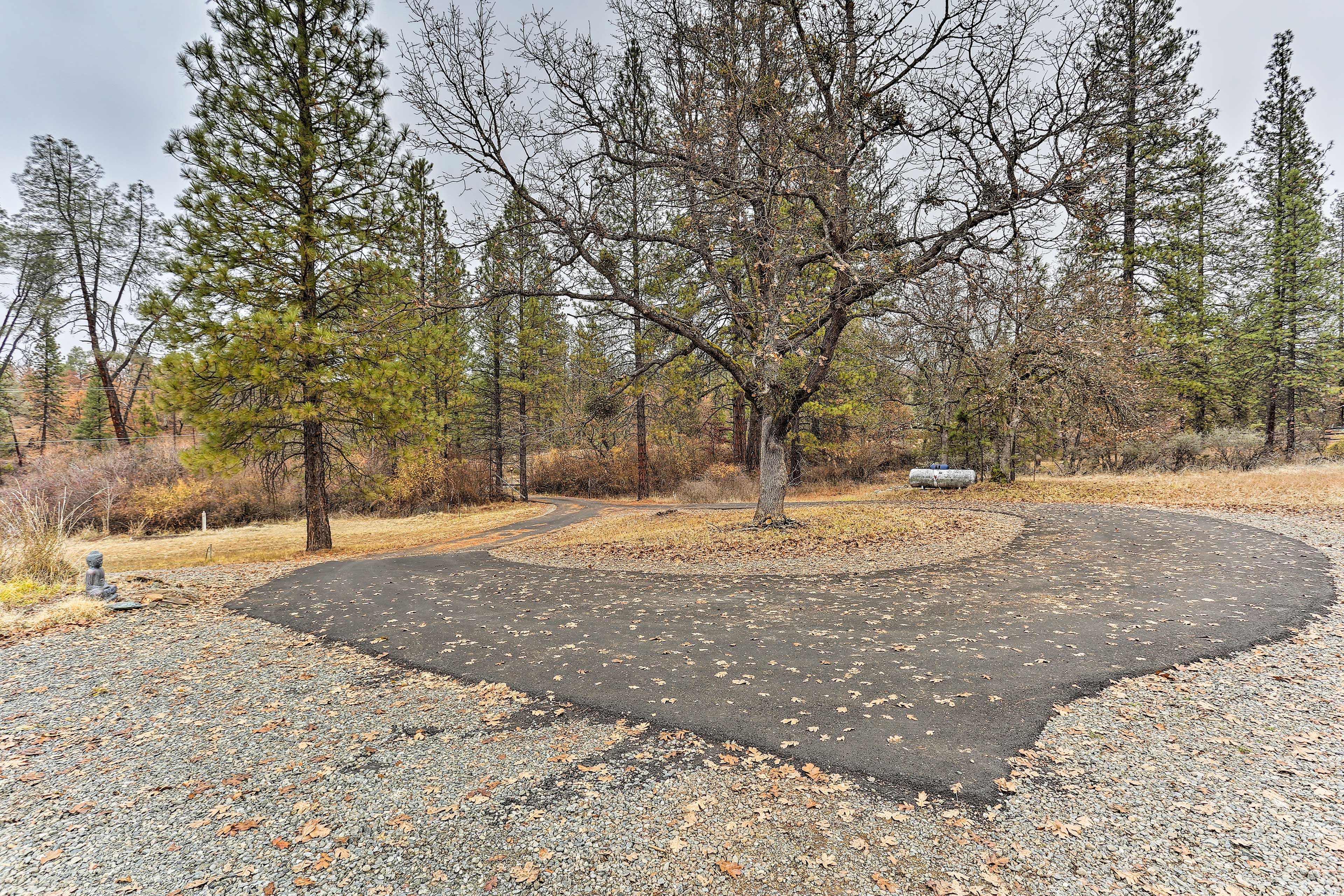 Many vehicles, RVs, trailers, or boats can be parked in the circle driveway.