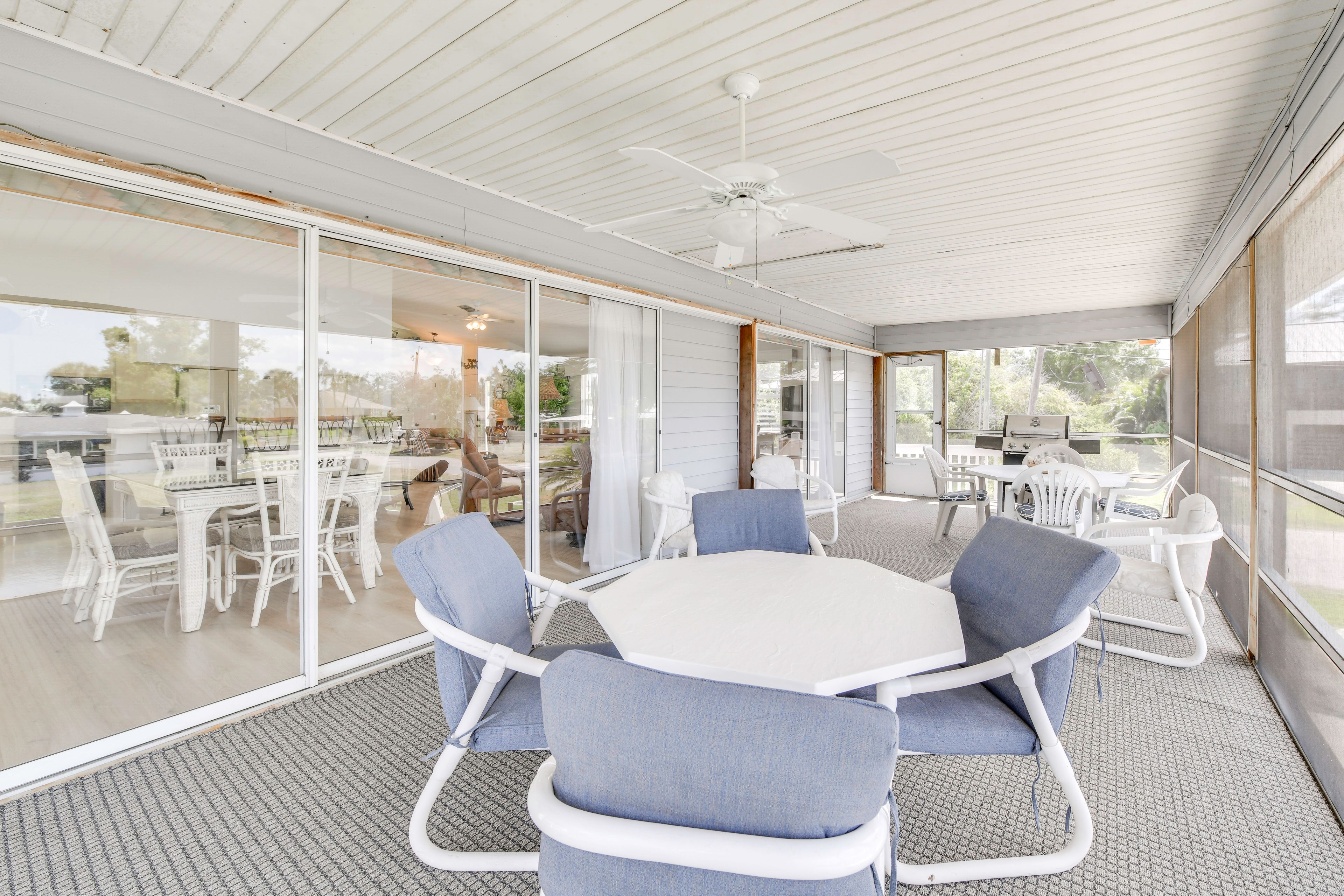 Dine with a view on the screened porch.