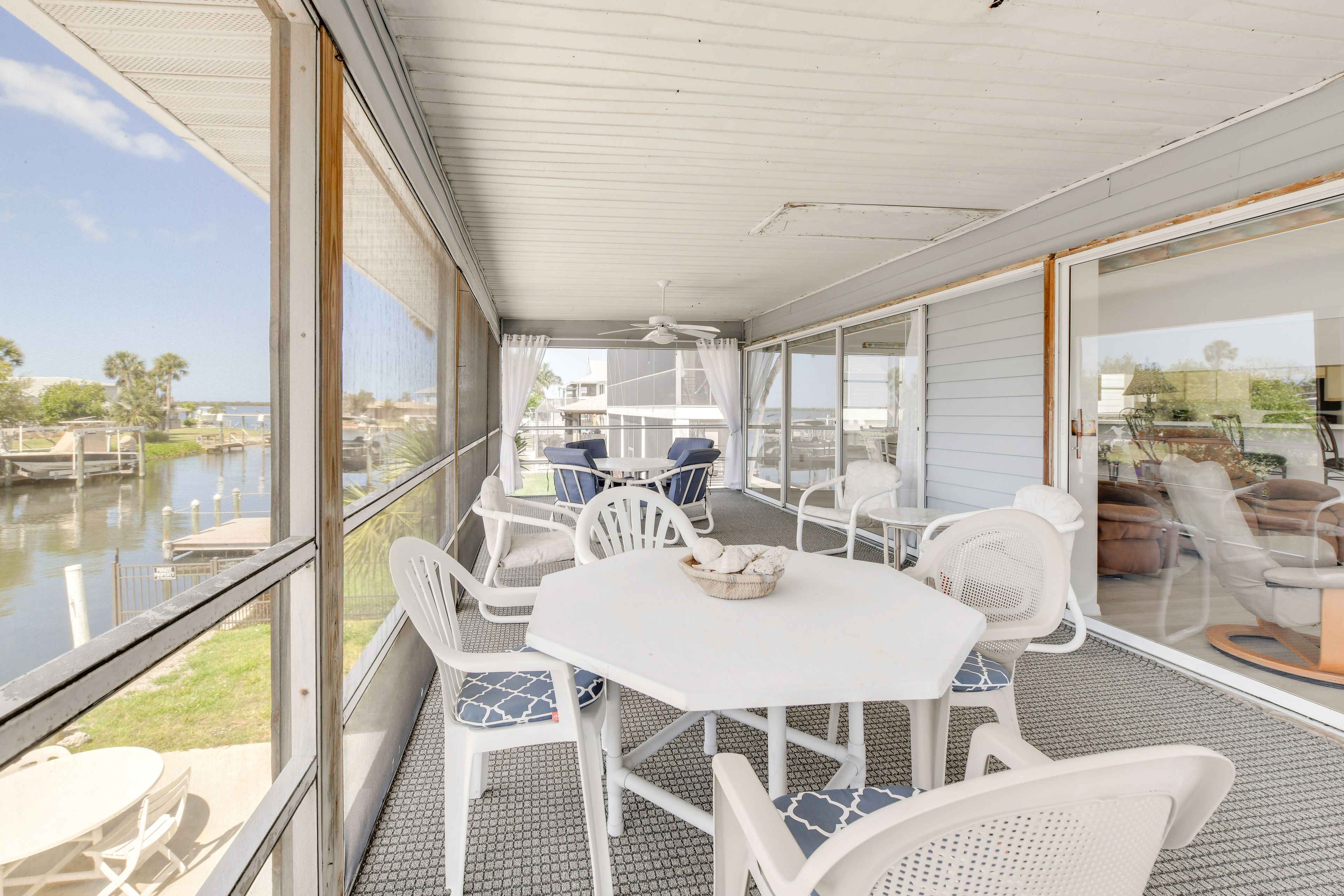 Look out over the canal from the enclosed porch.