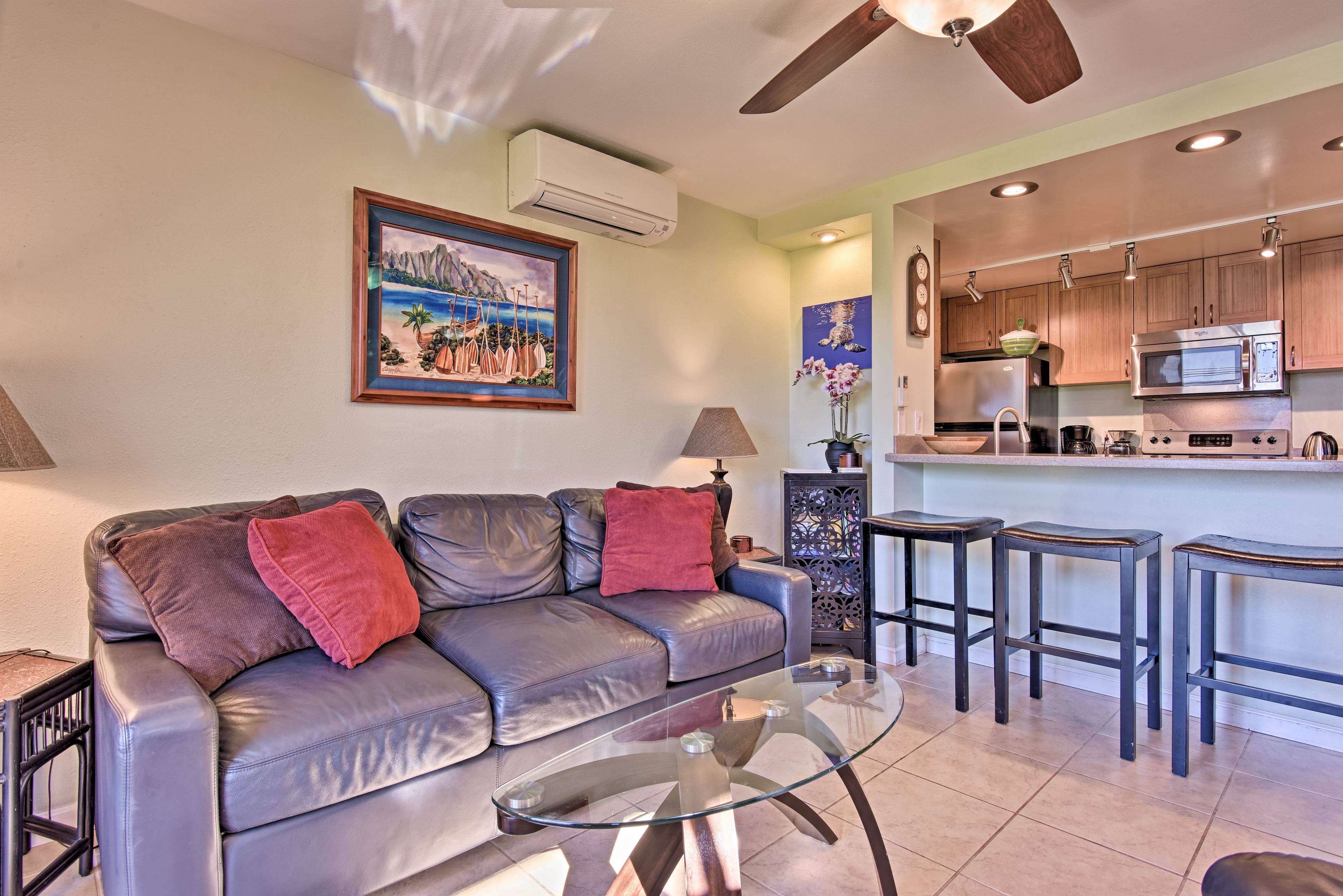 Breezy beach-themed decor adorns each room.