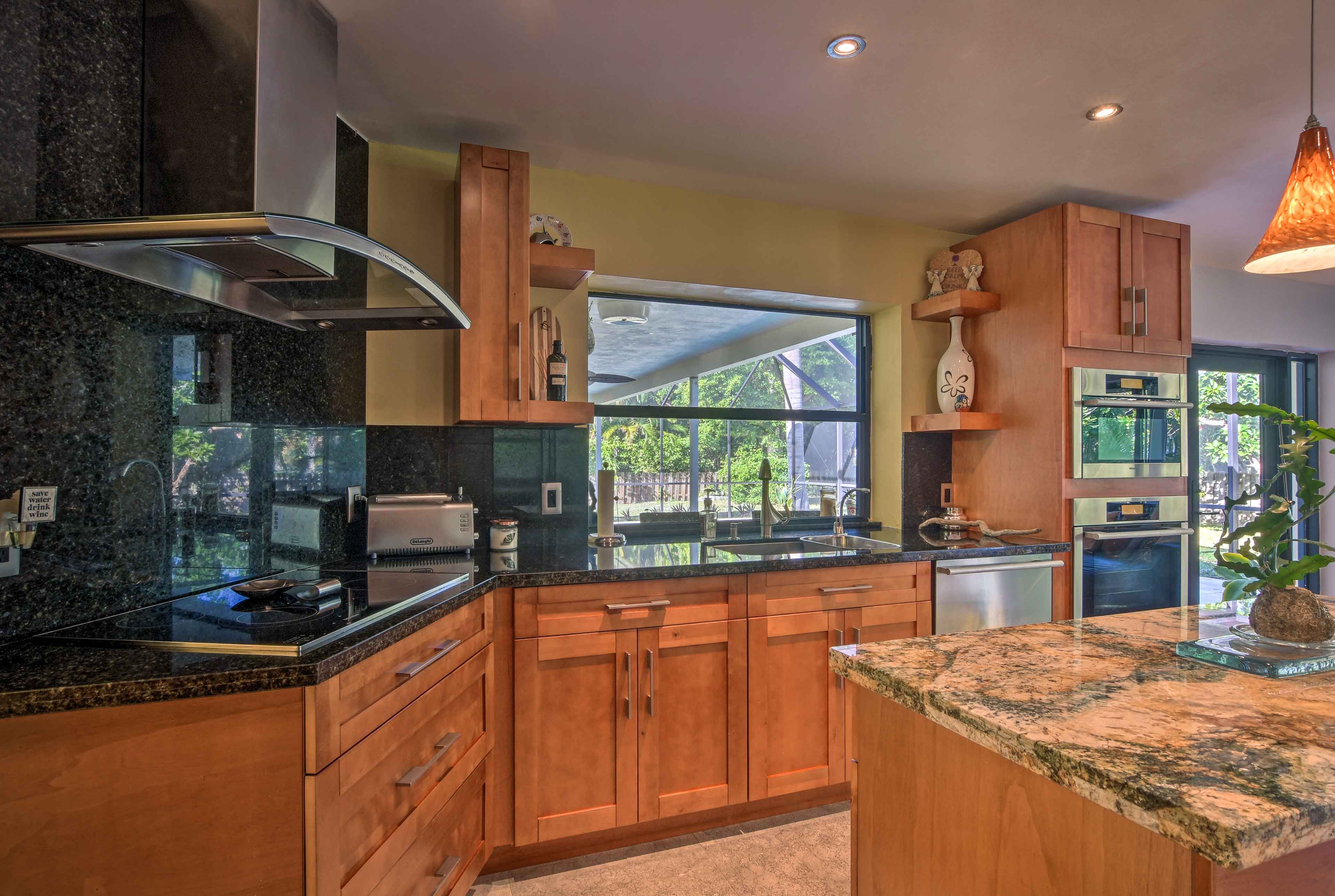 The kitchen features stainless steel appliances.