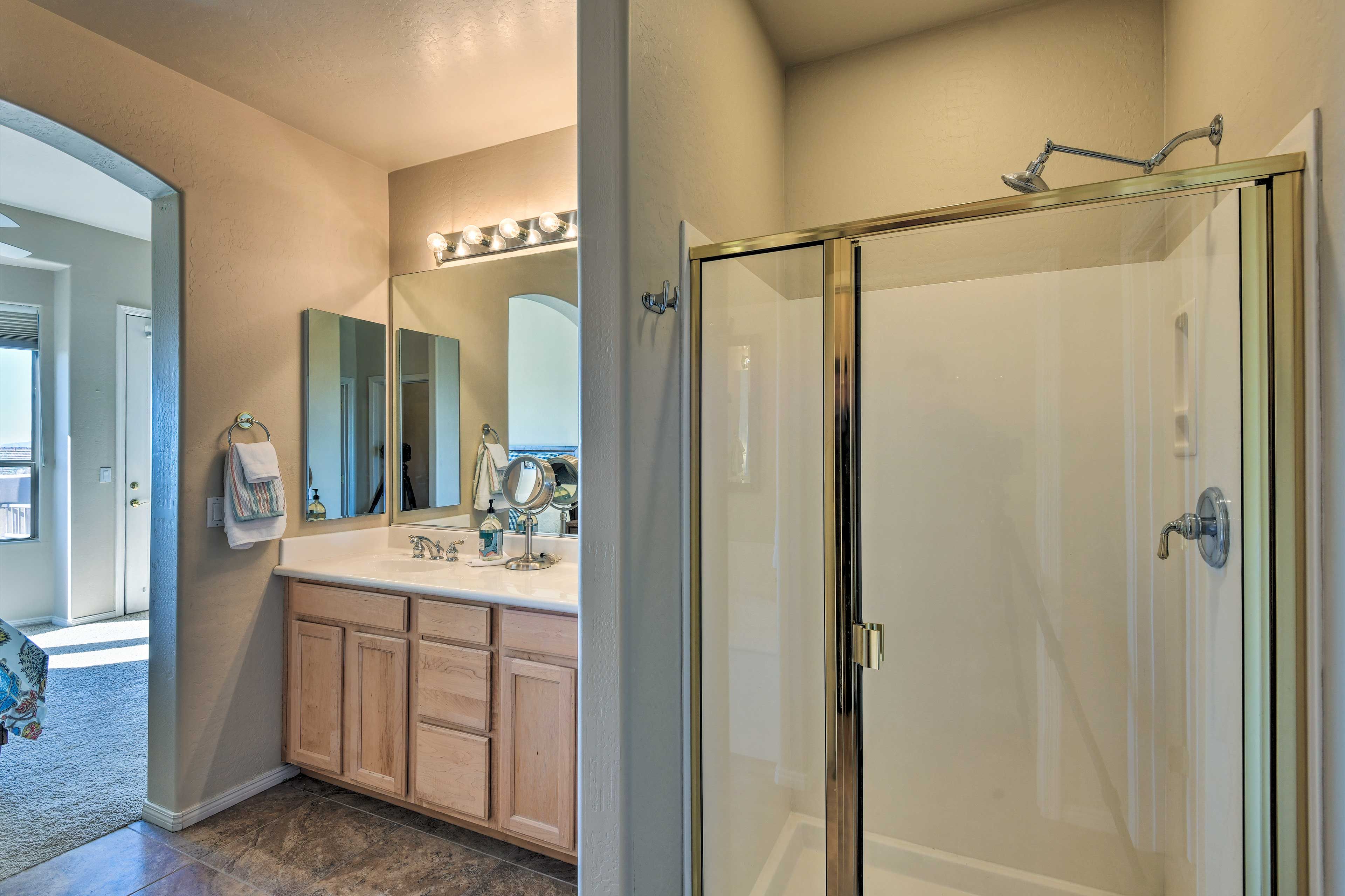 Rinse off dirt from the day's hike in the en-suite bath's walk-in shower.