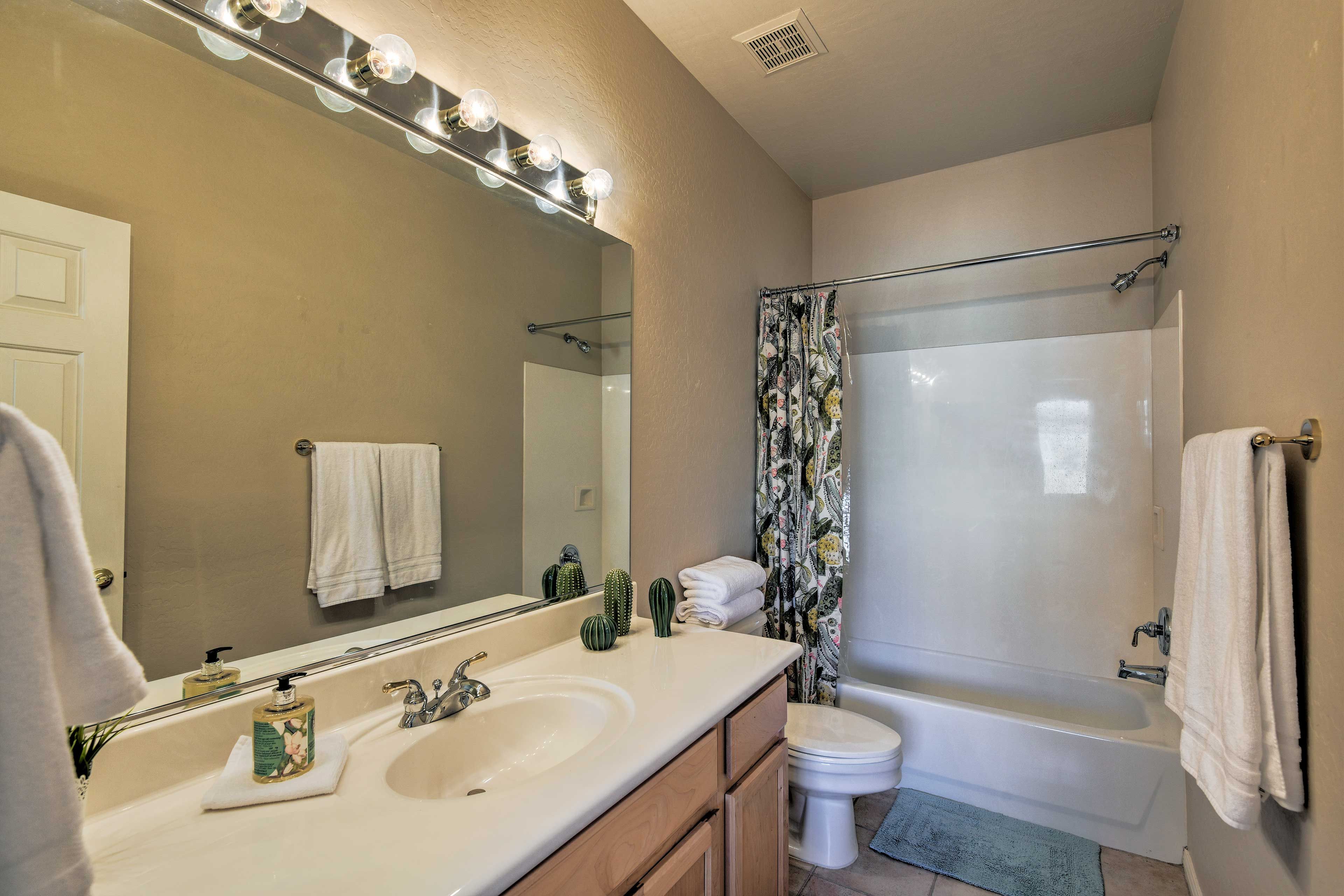The second bath features a spacious vanity and a shower/tub combo.