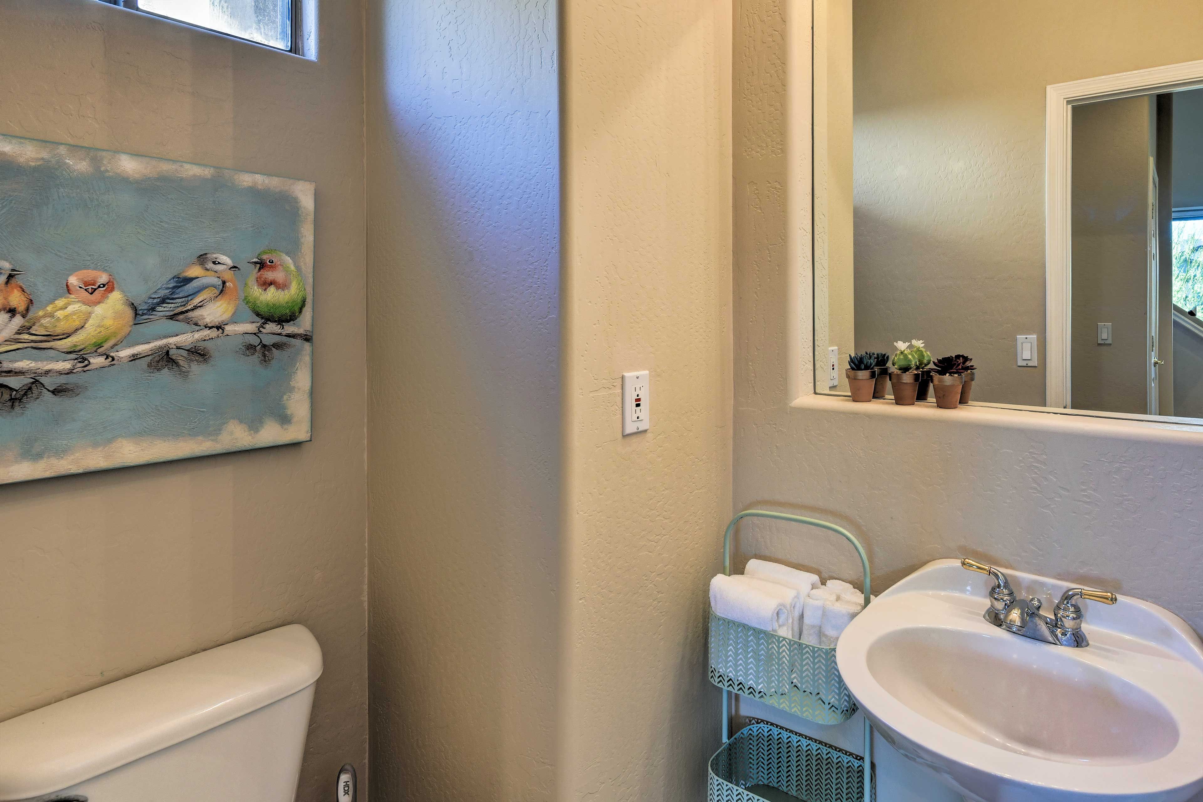 The home has 2 full bathrooms and 1 half bath.