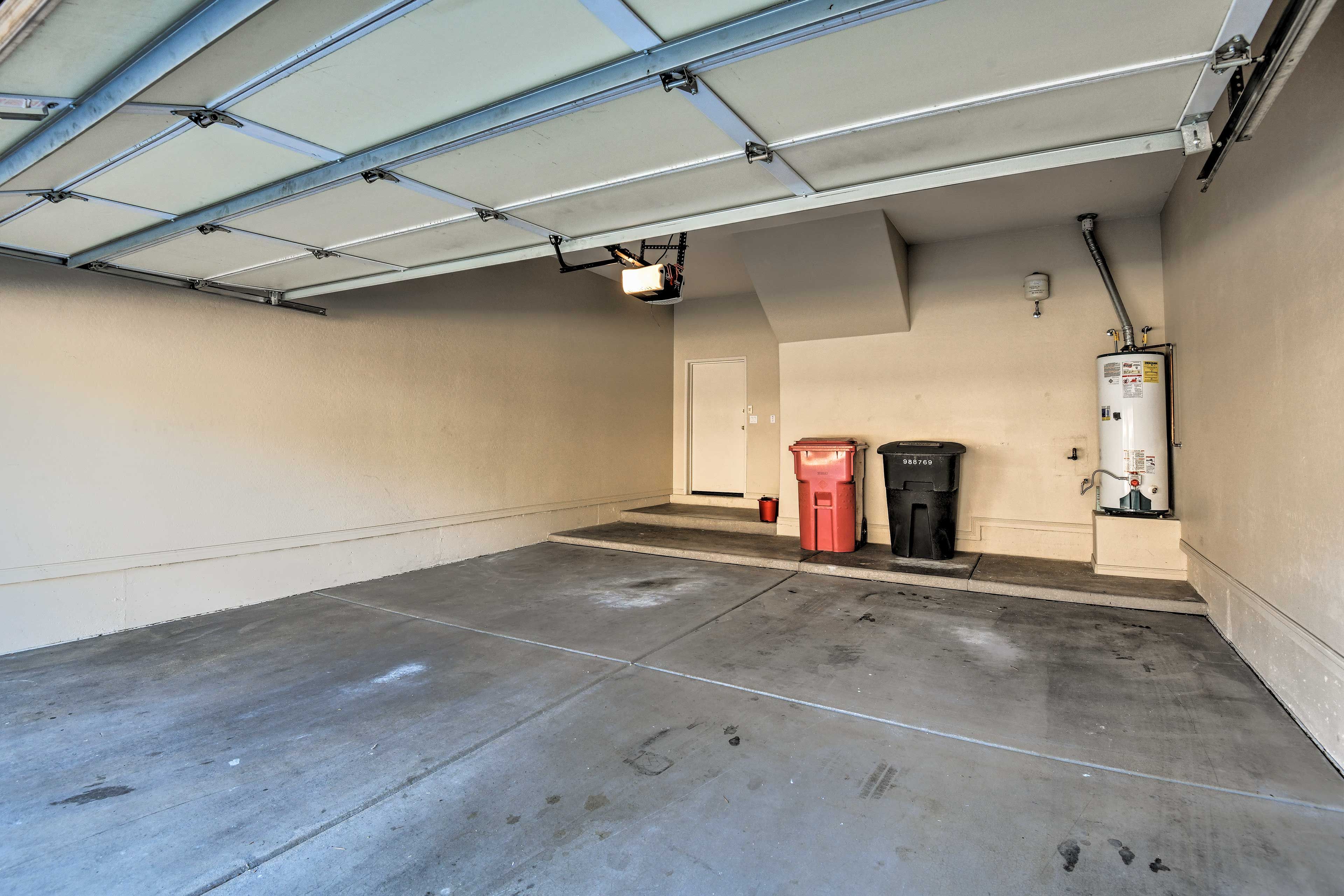 The garage has room for 2 cars, and 2 more can be parked in the driveway.