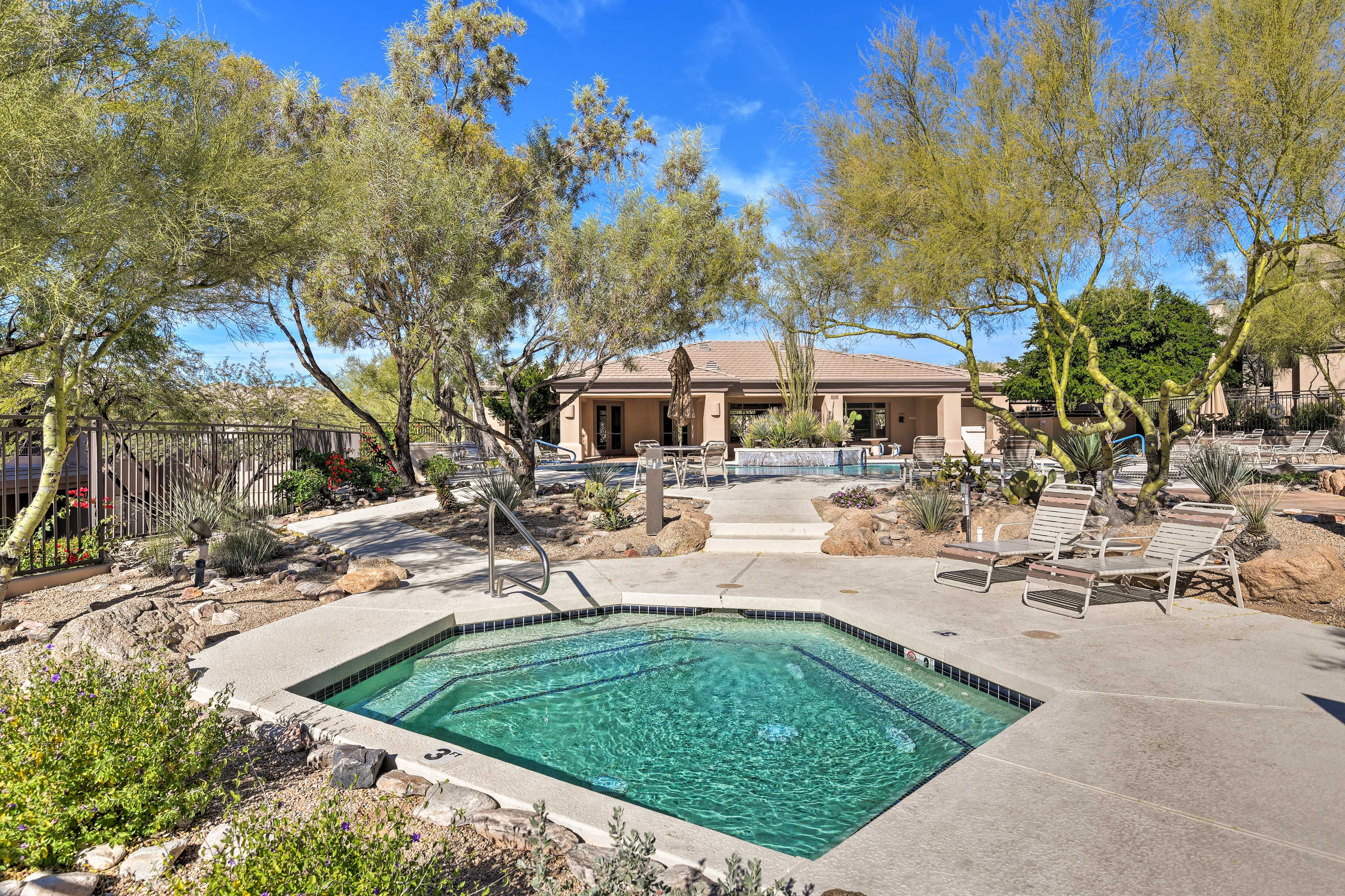 Grab a lounge chair and soak up the sun beside the garden view hot tub.