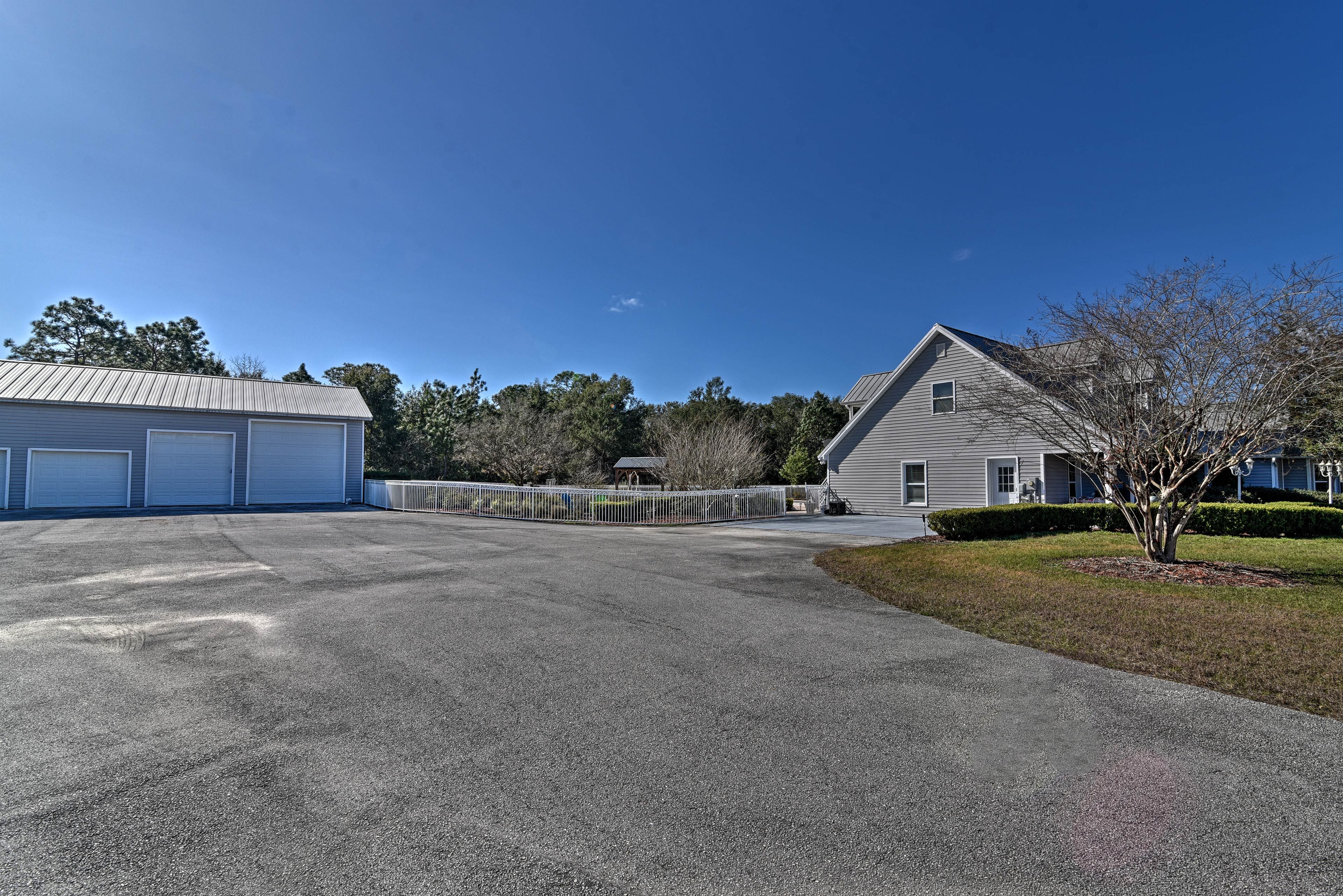 Two cars can park in the driveway. RV & trailer parking is also available.