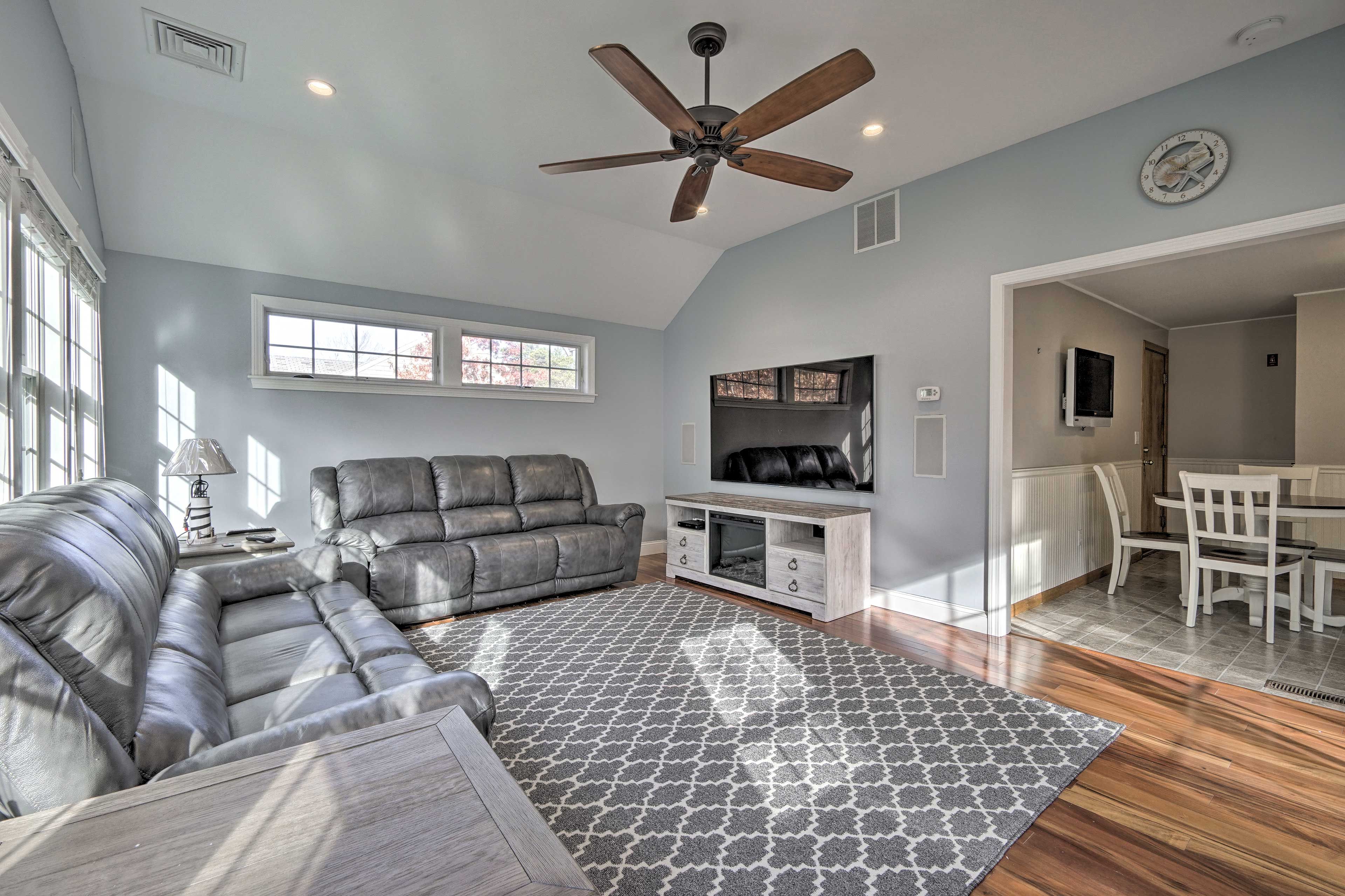 An open archway seamlessly connects the living and dining spaces.