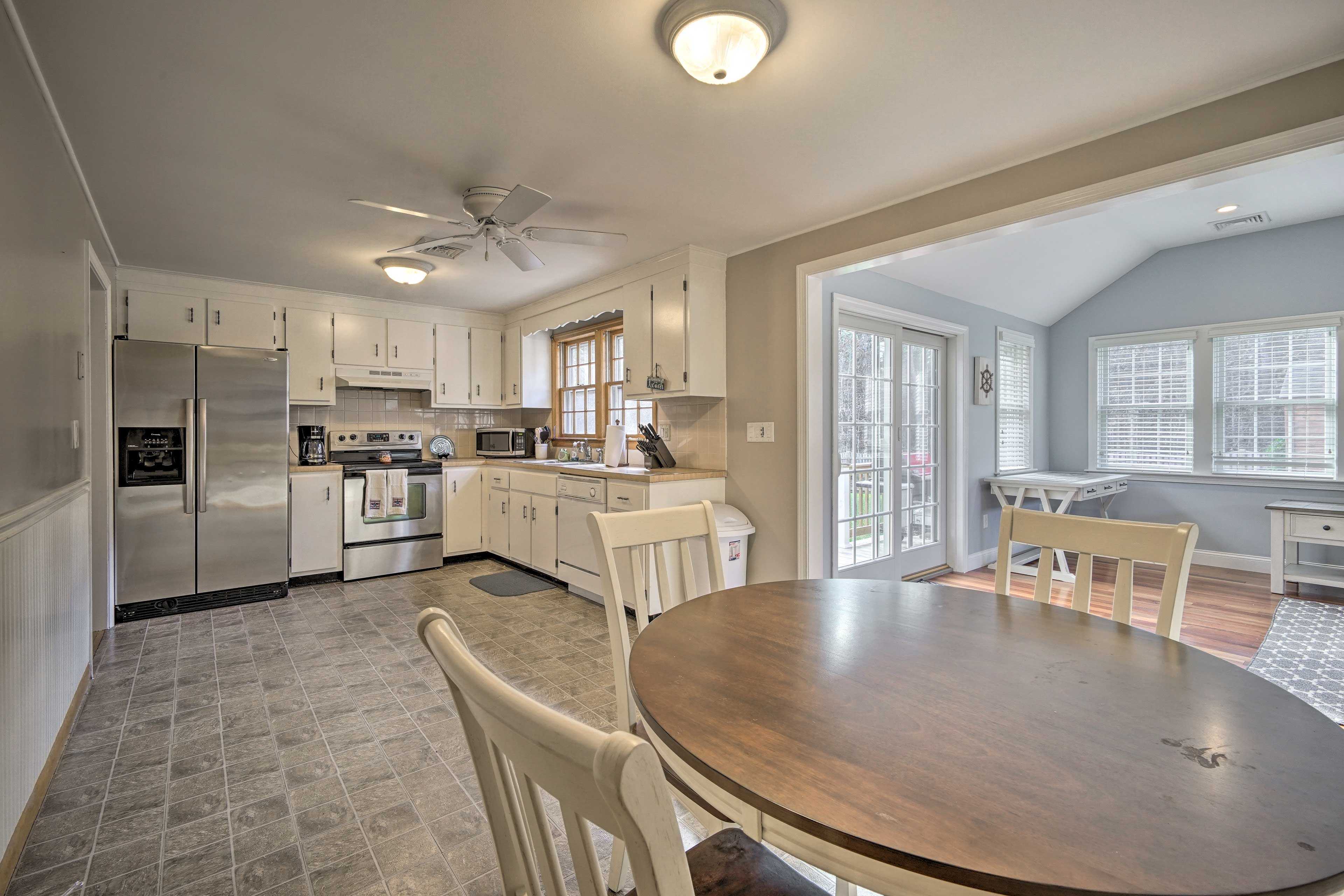 Serve dinner at this quaint wood dining table.