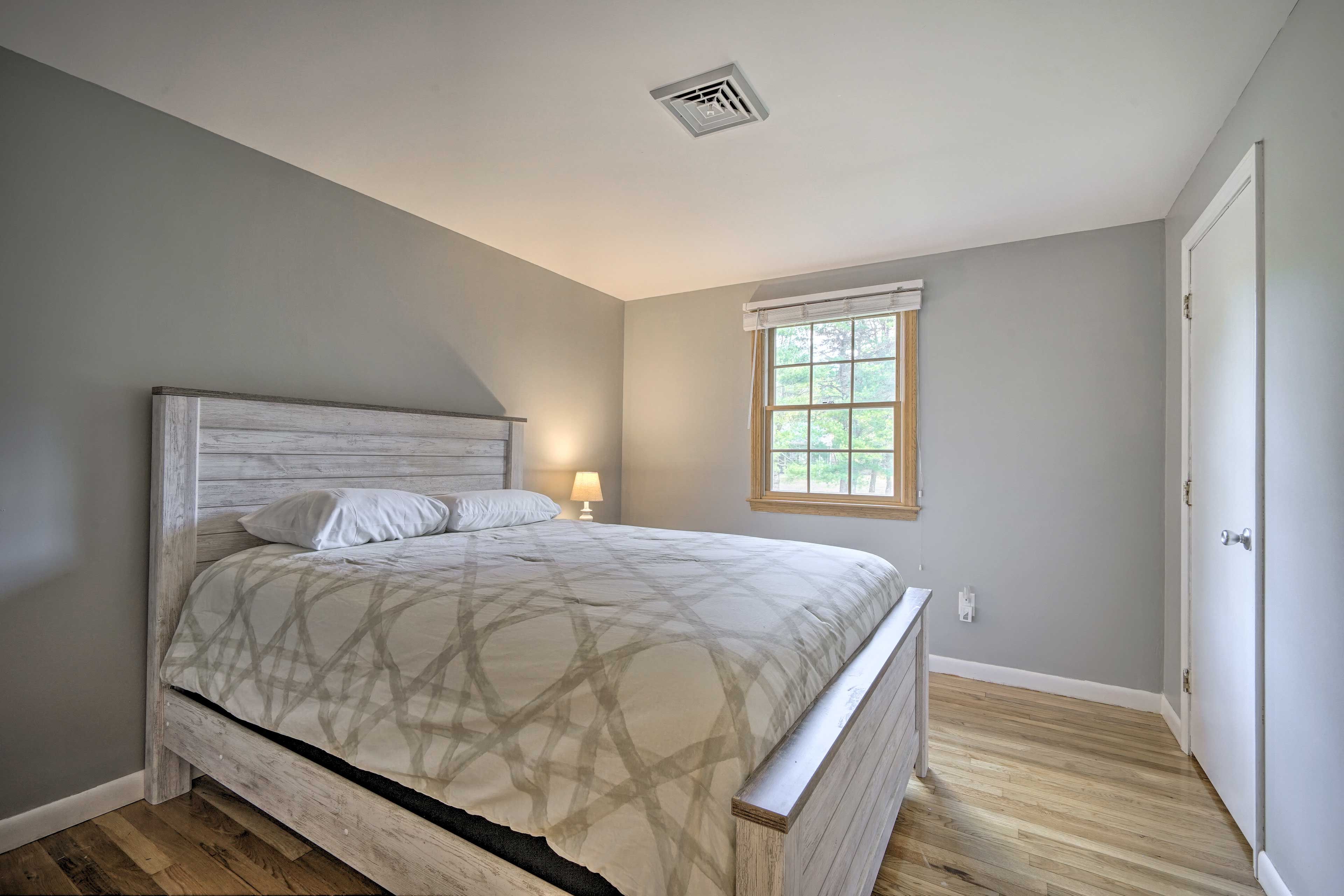 This next bedroom houses a queen-sized bed.