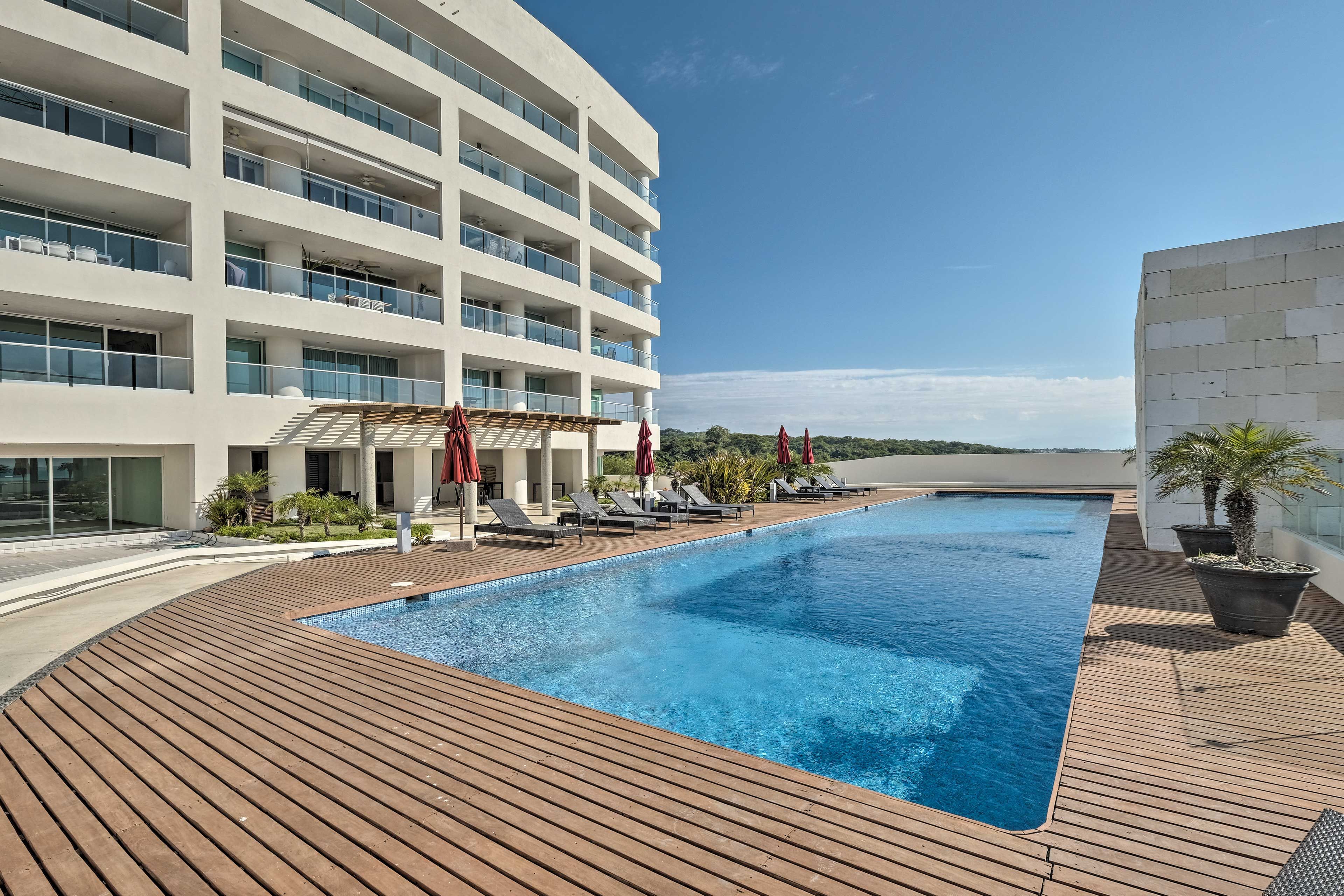 The rooftop deck comes complete with a stunning community pool.
