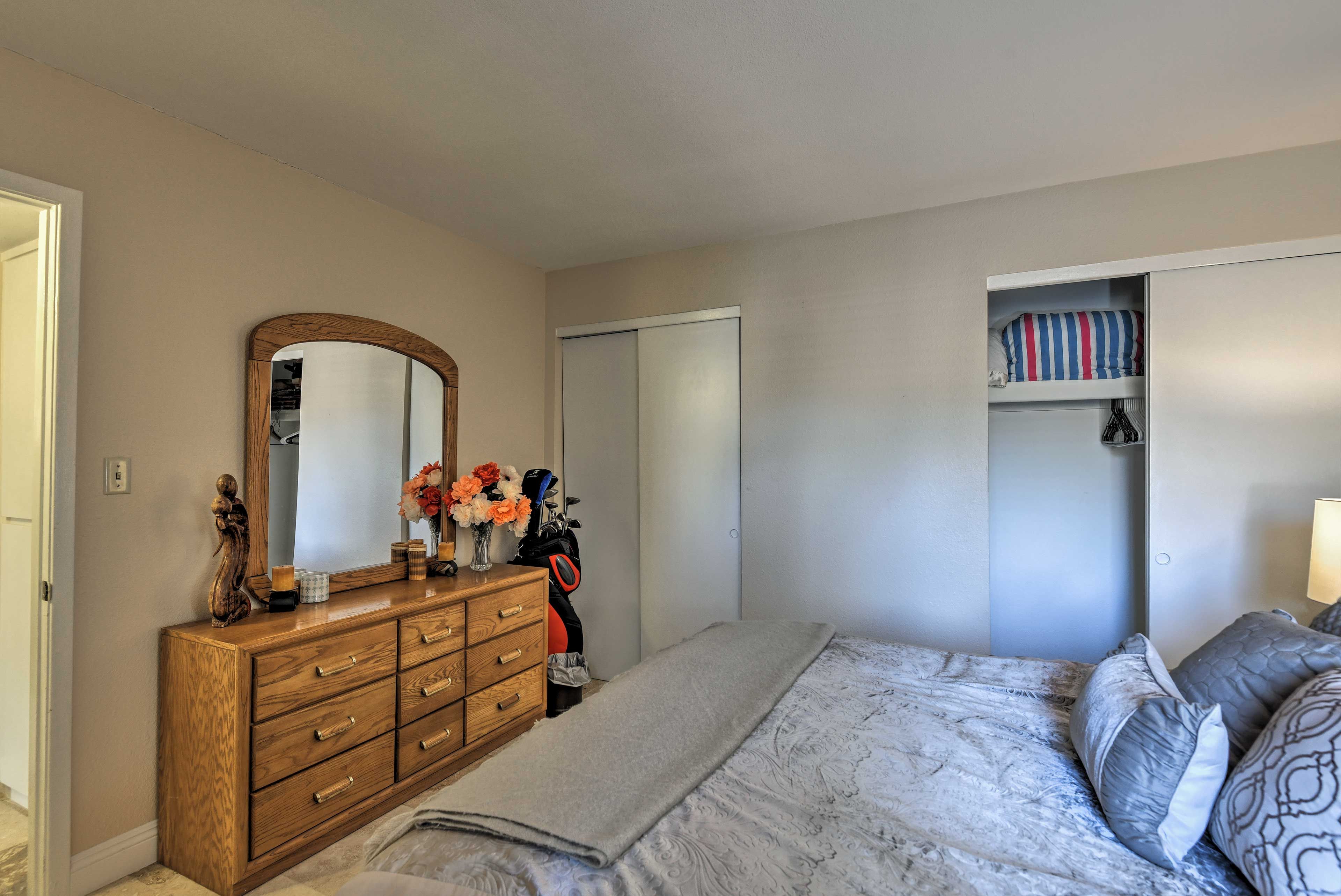 This bedroom also features plenty of storage space for your belongings.