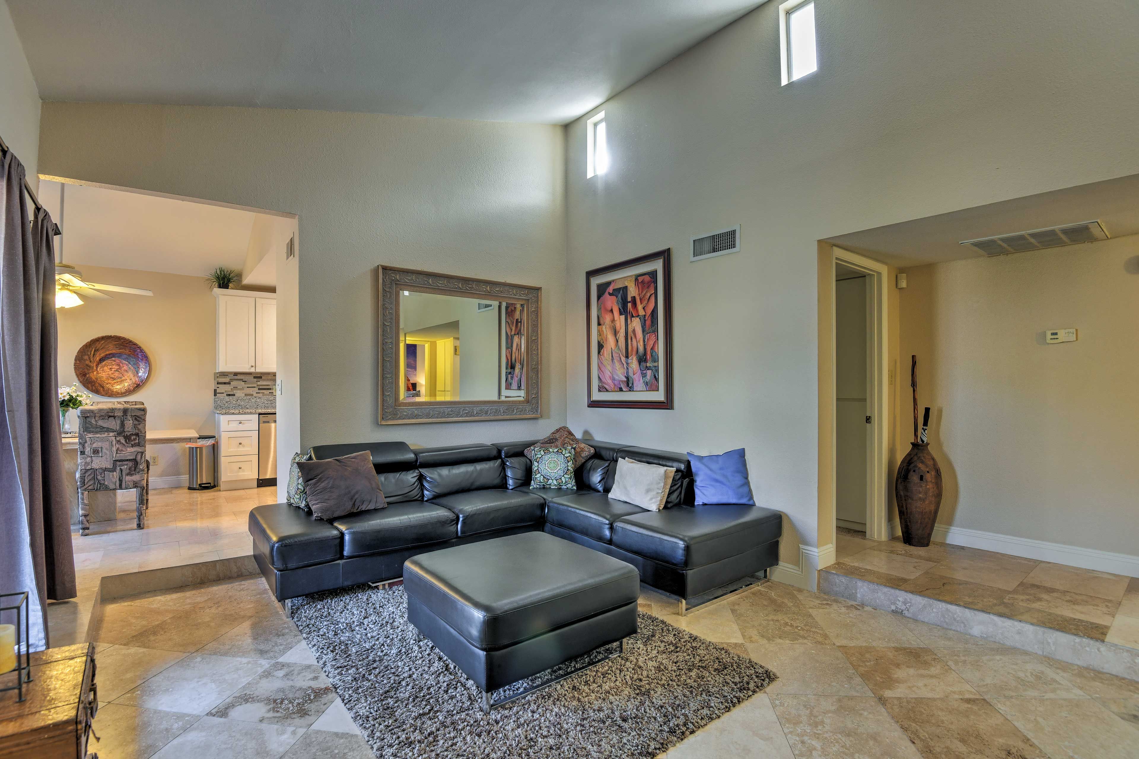 Watch shows on the flat-screen TV from the comfort of the couch.